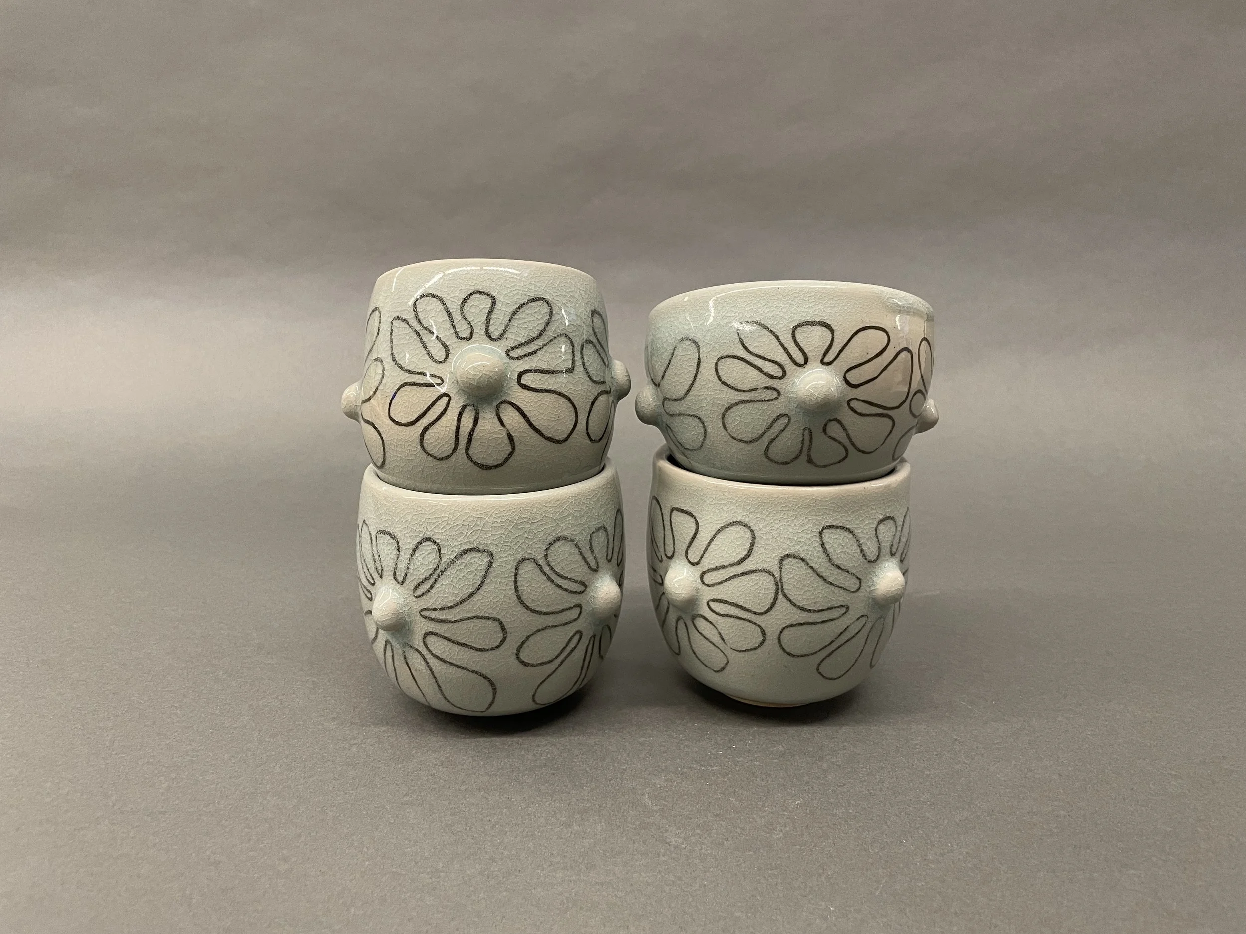 Flower cups, 2025, Stoneware and color slip inlay