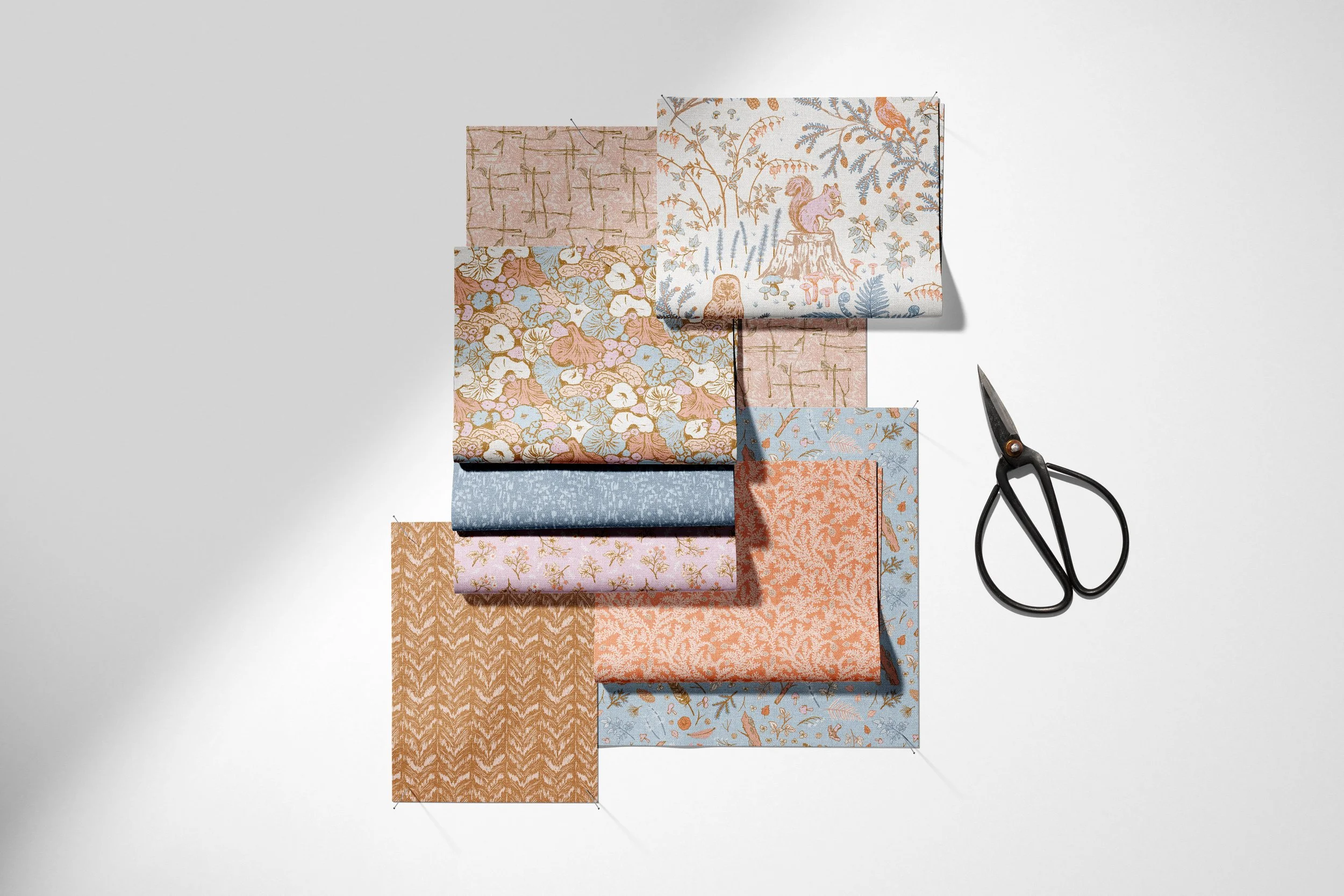 Botanical surface pattern fabric swatches in blush peach and dusty blue with vintage scissors by Jean Pham The Bright Leaf Design