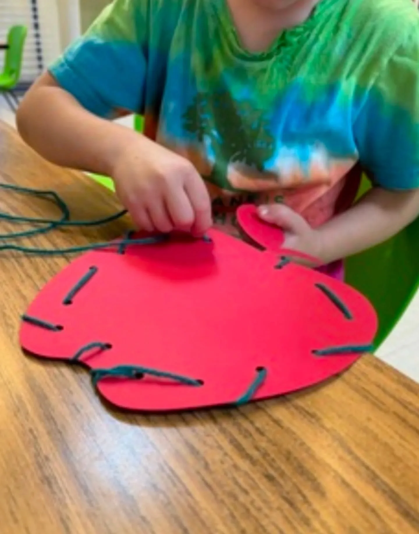 Establishing a solid pencil grip starts well before holding a pencil. Giving children many opportunities to engage in these fun activities makes them much more successful when they do pick up a pencil. 
-Playing with play dough
-Peeling and sticking 