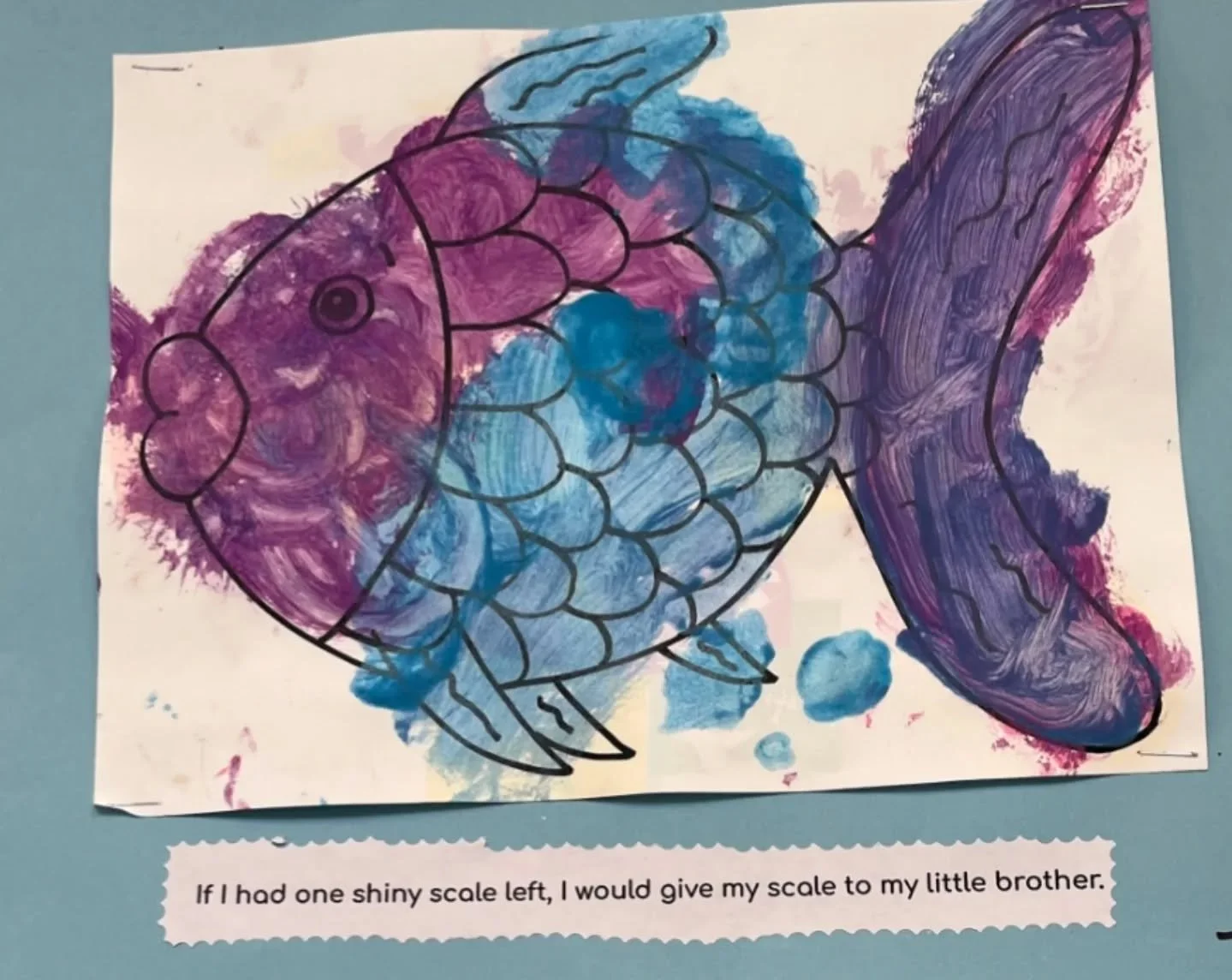 Classroom D dove deep down into the blue. They swam alongside scuba divers, sea turtles, mermaids, mermen, and tropical fish. The class read The Rainbow Fish and talked about the beauty of sharing and kindness. The children created their own rainbow 