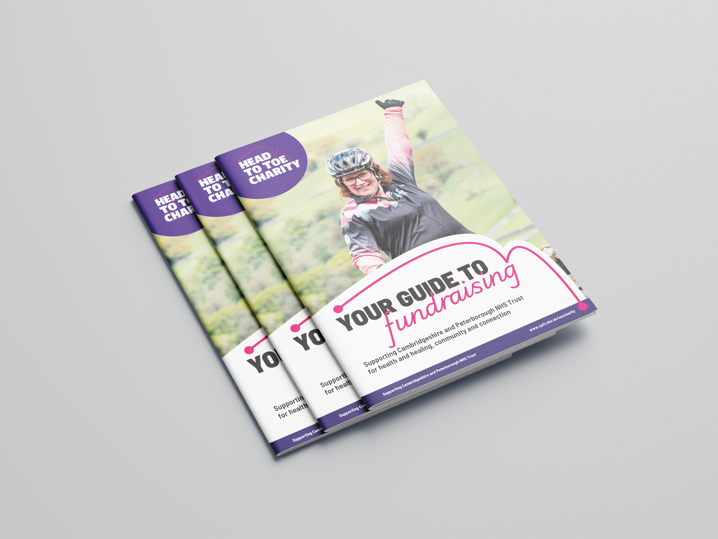 A stack of fundraising packs for Head to Toe.