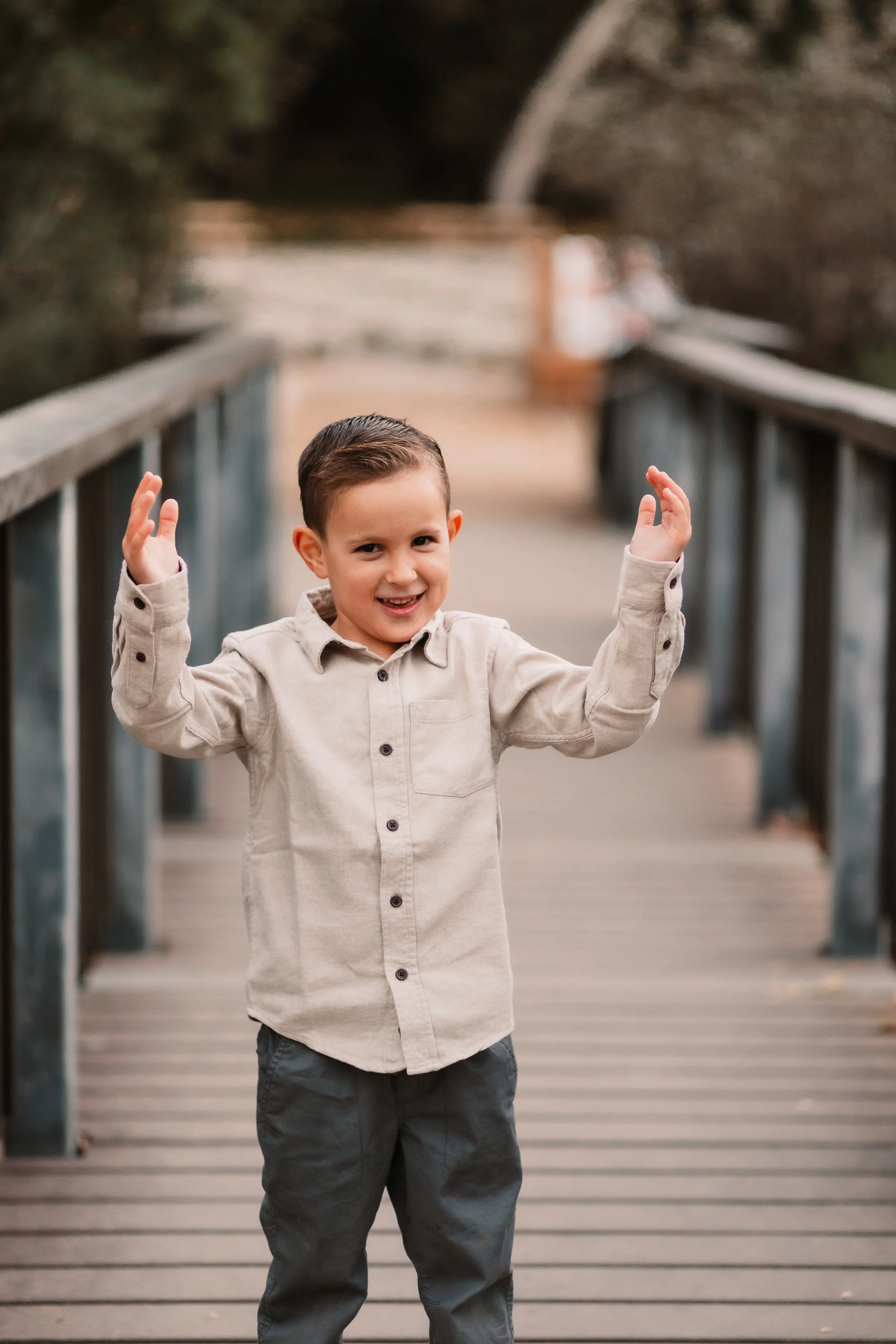 Young boy standing on the wood bridge at Placerita Canyon, Santa Clarita family photography