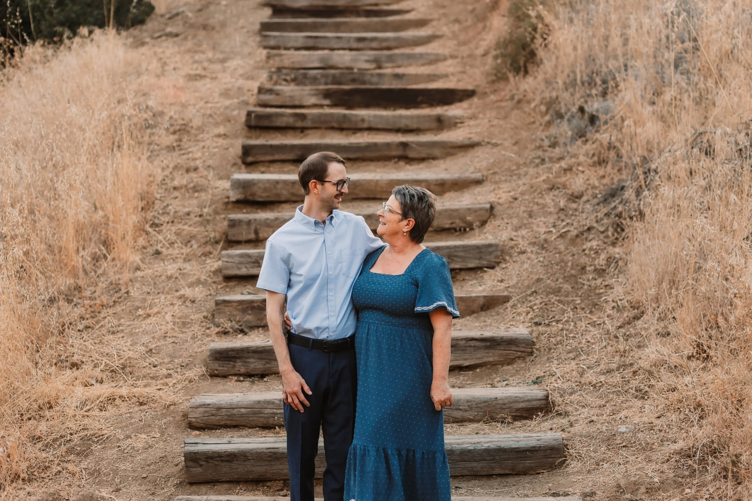 Mom and her son on the wooden trail steps at Placerita Canyon, Santa Clarita family photography