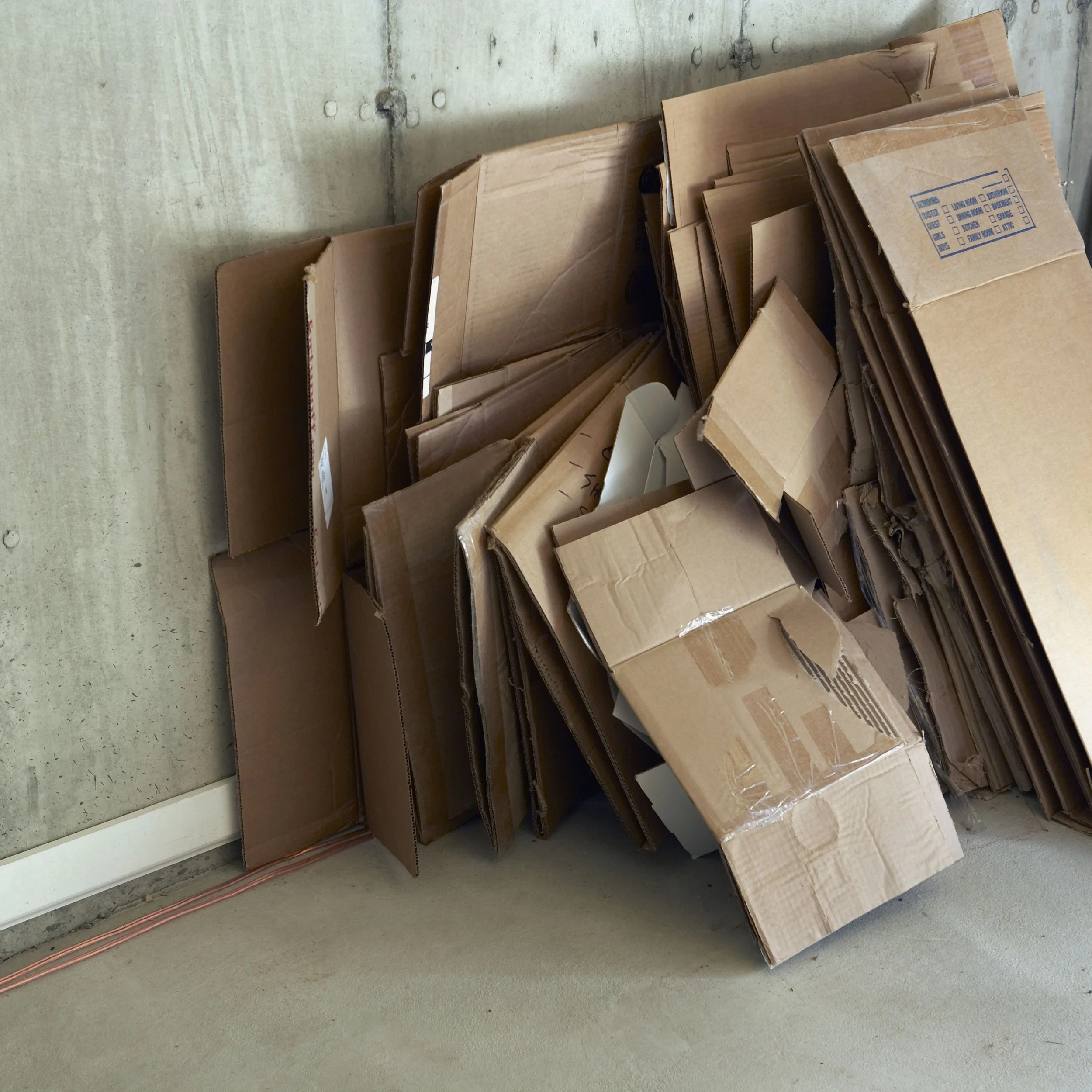 broken-down-cardboard-boxes-78777597-5bc0e2004cedfd00268c8310.jpg