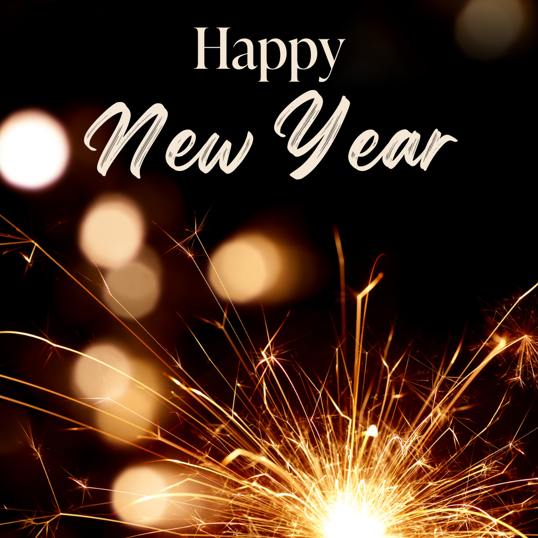 Happy New Year text with sparklers and bokeh lights against a black background.