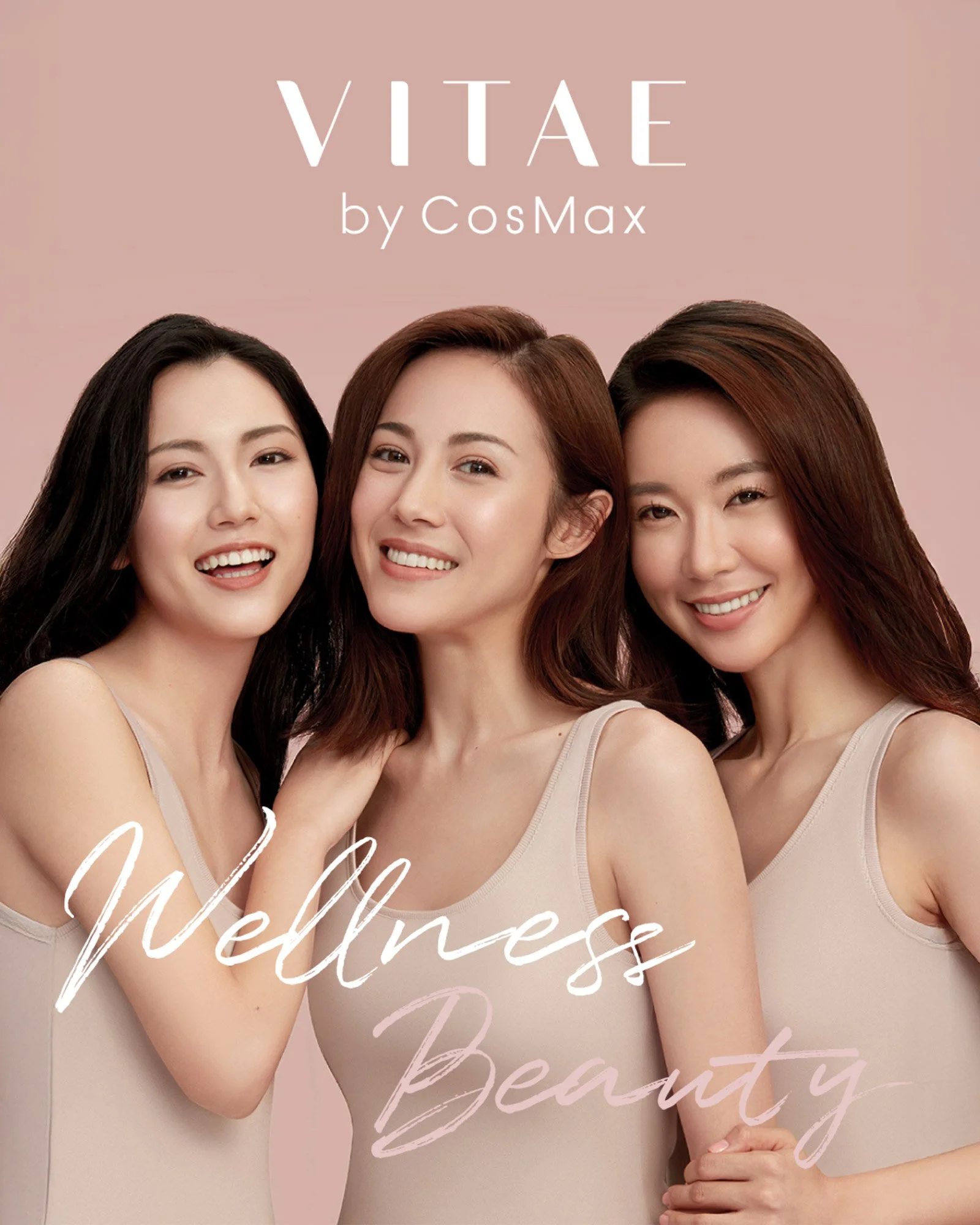 Three women smiling in beige tank tops against a pink background, with the words 'VITAE by CosMax' and 'Wellness & Beauty' written on the image.