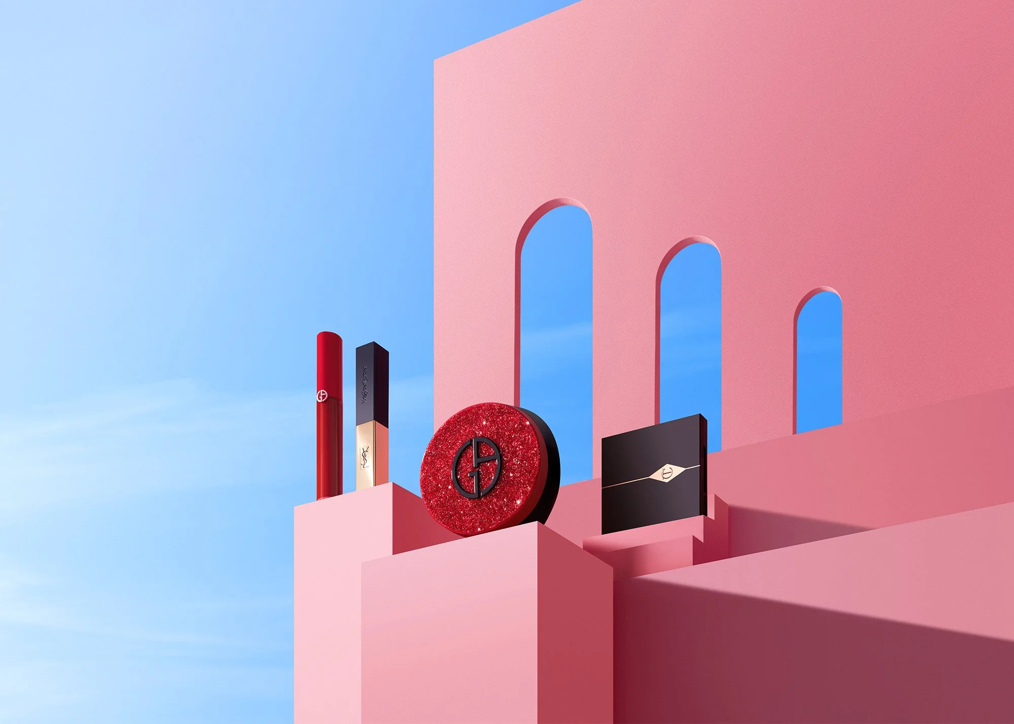 Pink geometric backdrop with arched cutouts, displaying makeup products including lipstick, blush, and eyeshadow with brand logos.