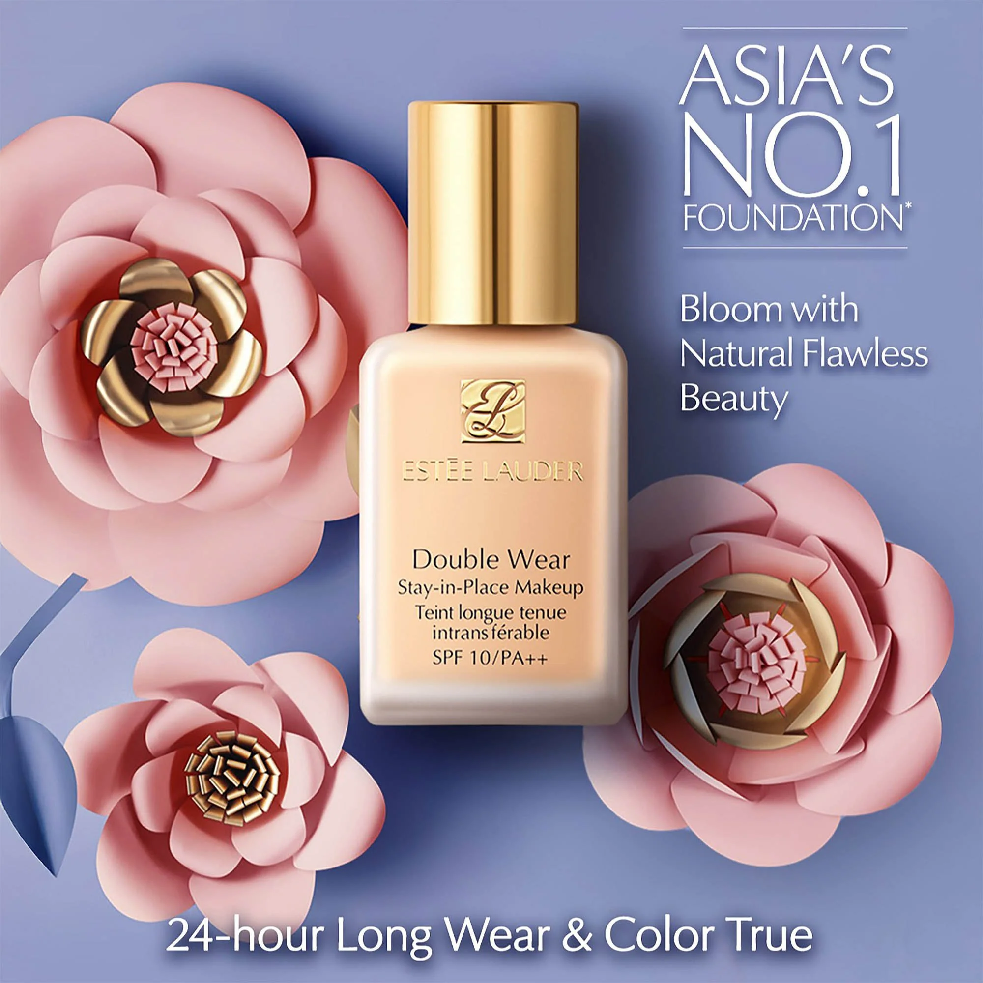 A bottle of Estée Lauder Double Wear Stay-in-Place Makeup foundation with SPF 10/PA++ placed on a pastel blue background, surrounded by pink and gold paper flowers. Text on the image highlights the product as 'Asia's No. 1 Foundation' and 'Bloom with