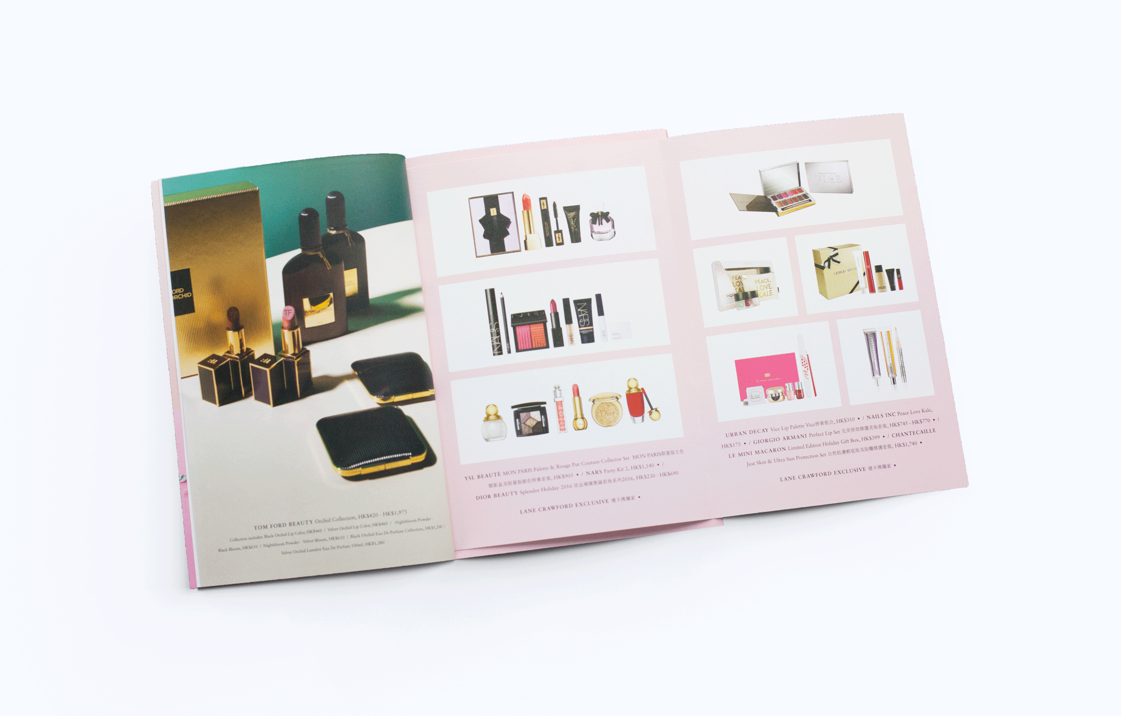 Open pink catalog or brochure displaying various cosmetics and beauty products, including perfumes, lipsticks, eyeshadow palettes, and skincare items, with a white background.