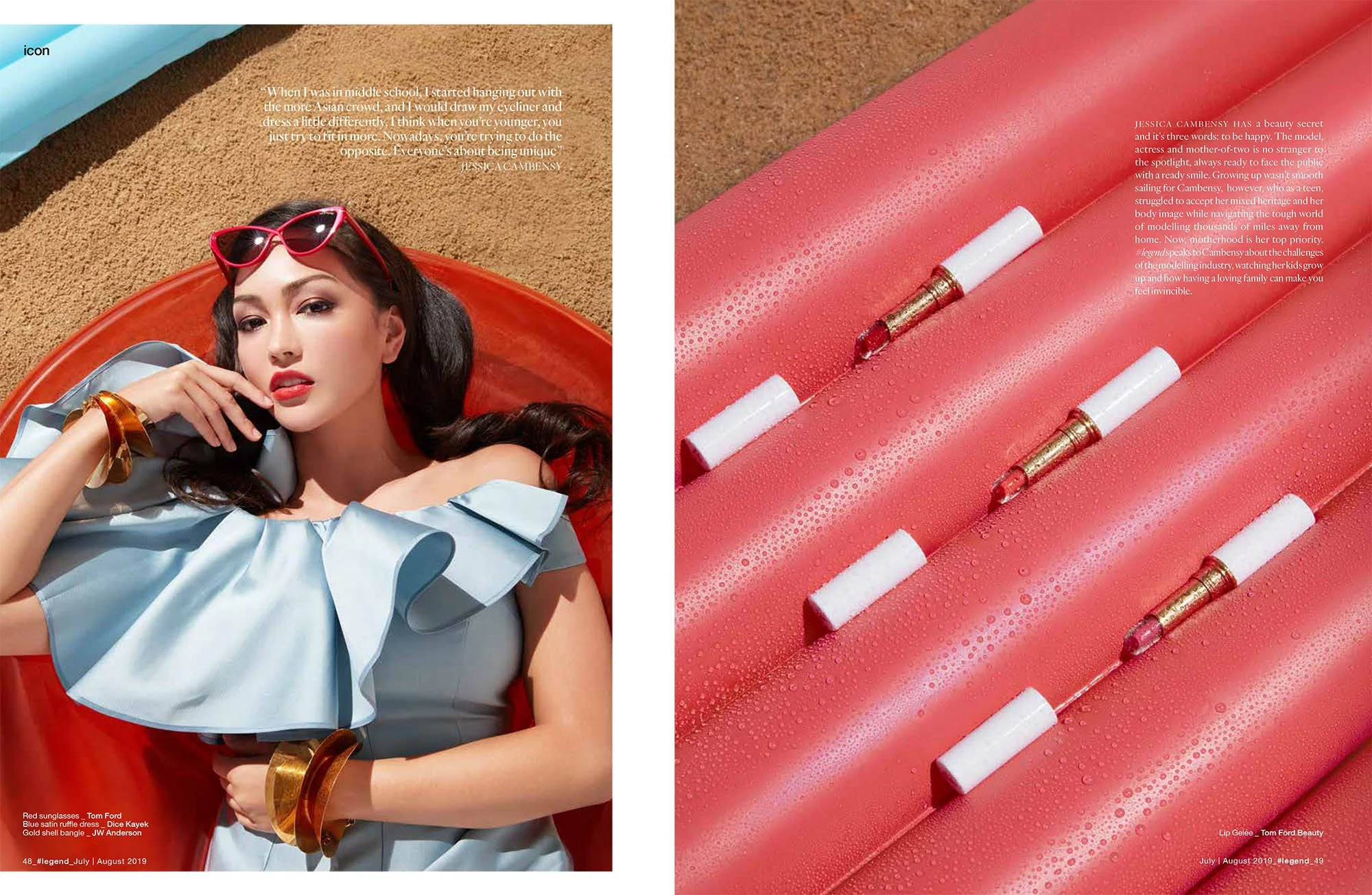 A photograph of a woman lying on a red lounge chair on a sandy beach. She is wearing red sunglasses, a light blue dress with ruffled sleeves, and gold bangles. The right side of the image shows a close-up of a pink, electric device with water droplet