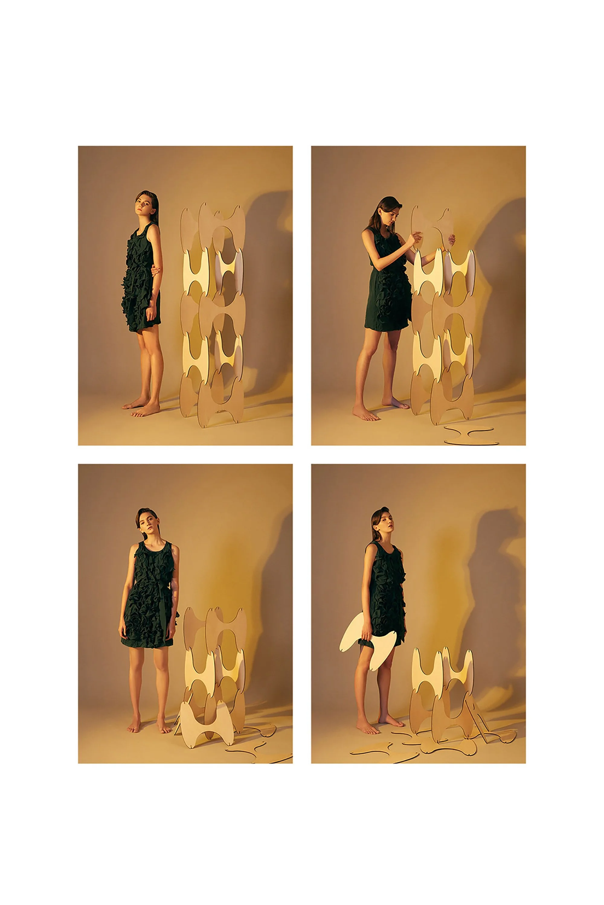 A series of four photos featuring a woman in a dark green dress with floral patterns, posing and interacting with a wooden art installation and white abstract shapes. In the first photo, she stands barefoot next to the installation looking upward. In