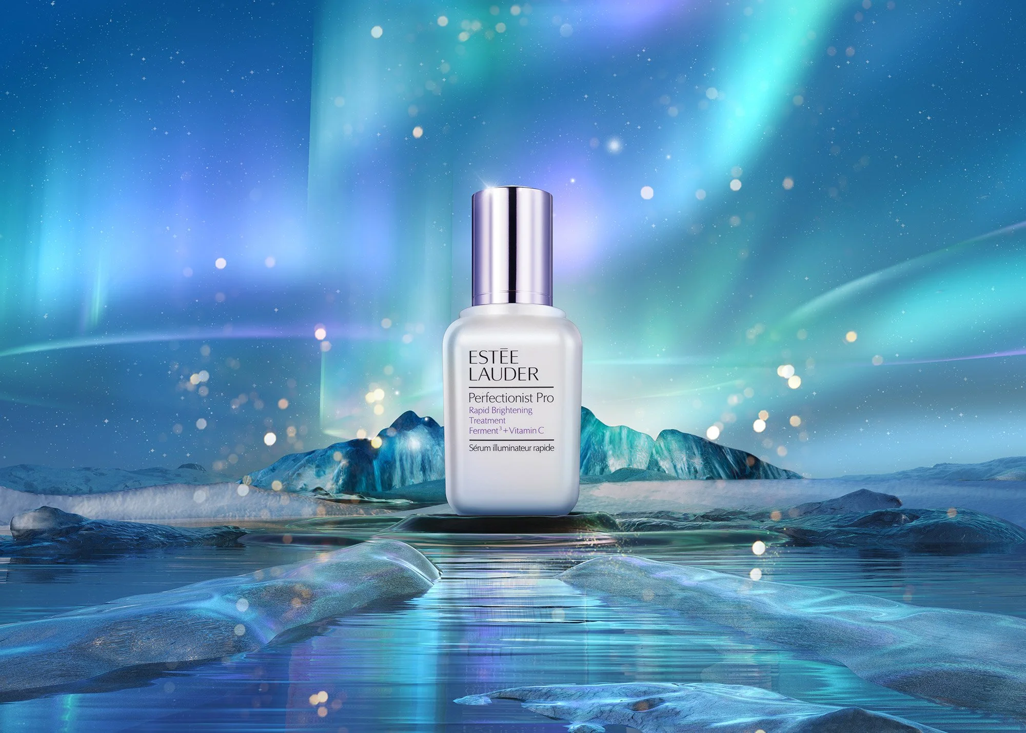 A bottle of Estée Lauder Perfectionist Pro Rapid Brightening Treatment on an icy landscape with polar icebergs and aurora borealis in the background.