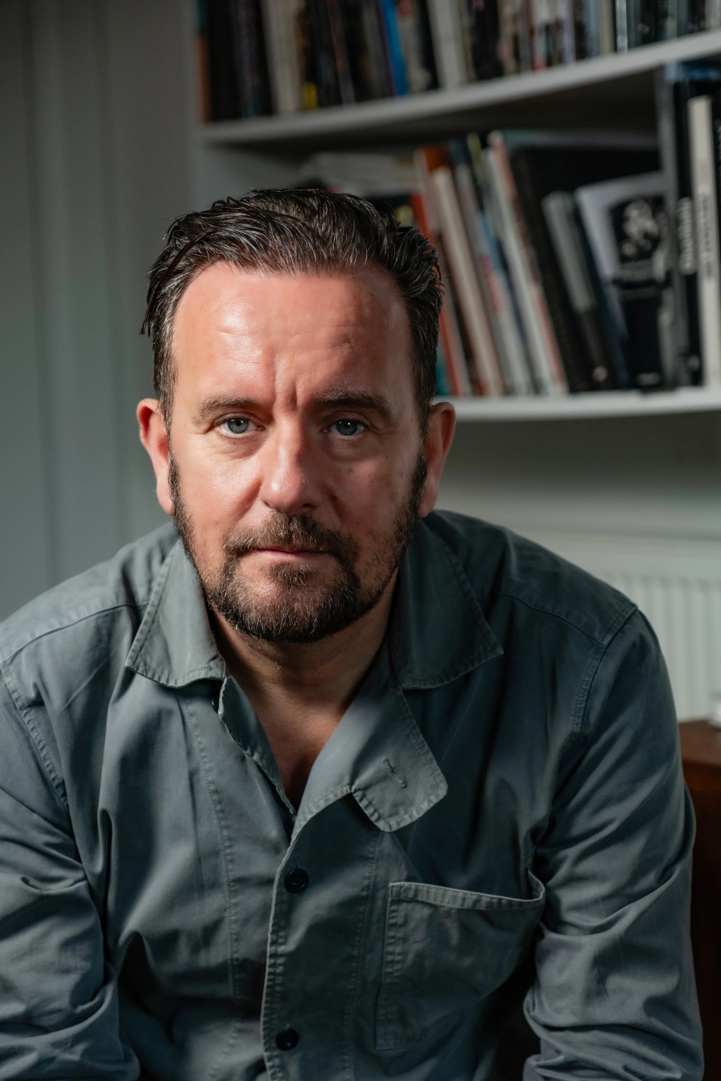 Photographer and Filmmaker Chris Leslie photographed in his home studio. Glasgow, October 2025. Photographed by Scottish Portrait Photographer Mark Cameron
