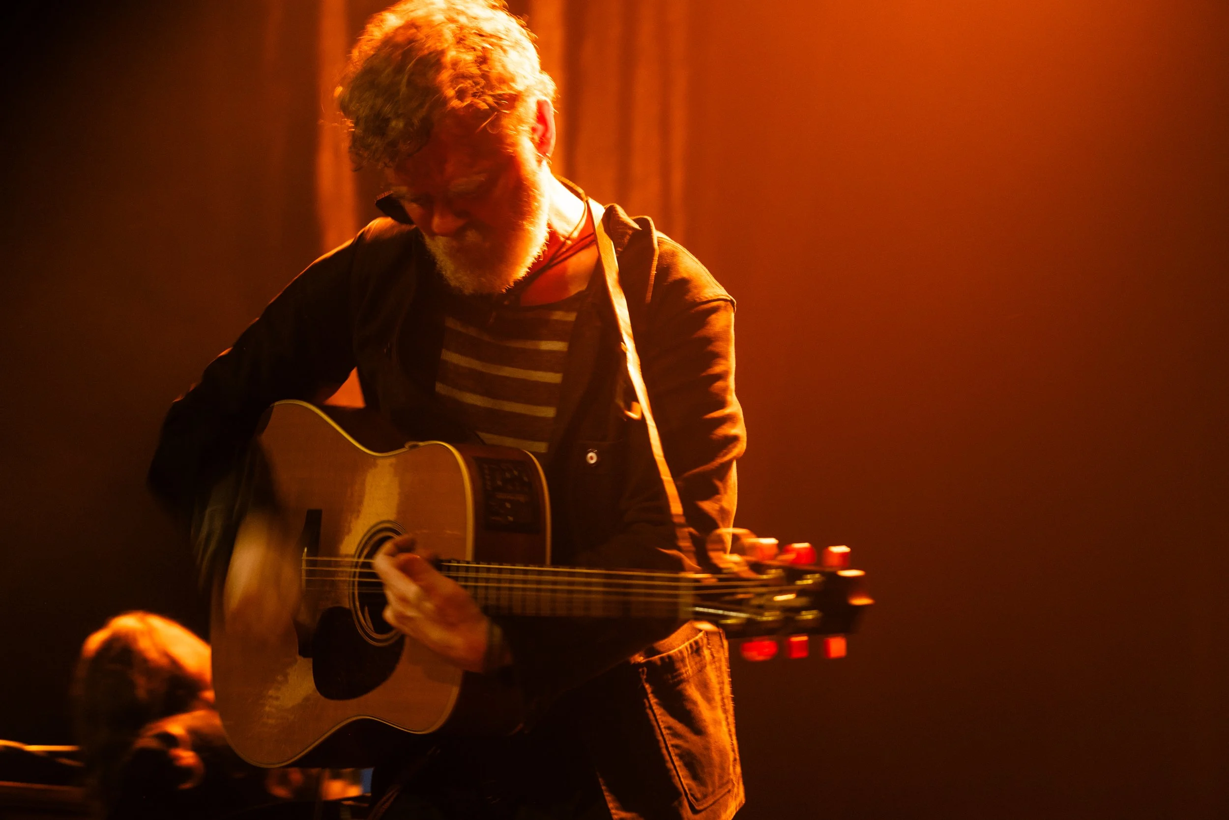 Glen Hansard perfoimrig at the Glasgow Brrowlands. Photographed by live music photographer Mark Cameron.