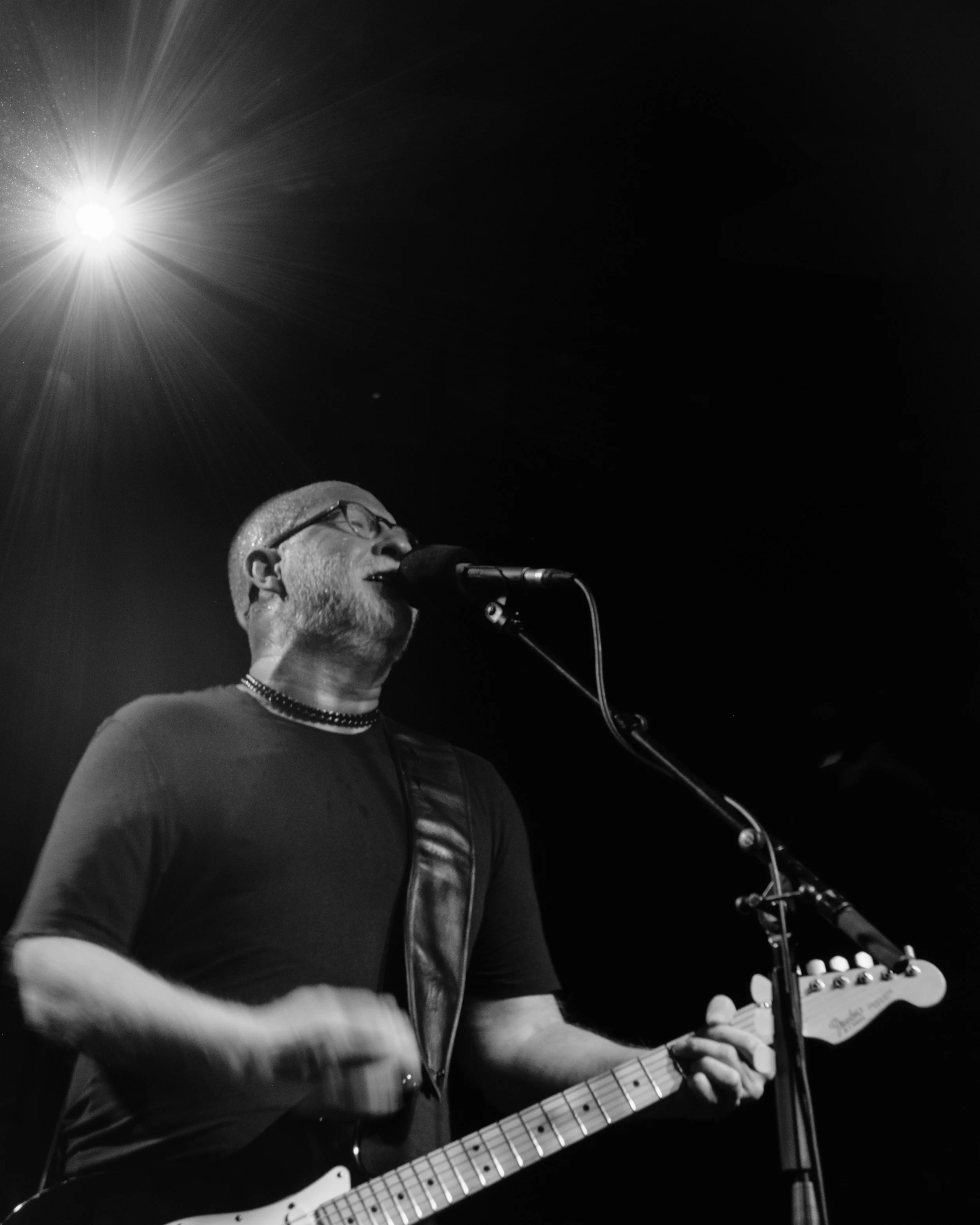 Bob Mould of Sugar and Husker Du performing on stage. the Barrowlands Glasgow. Photographed by live music photographer Mark Cameron