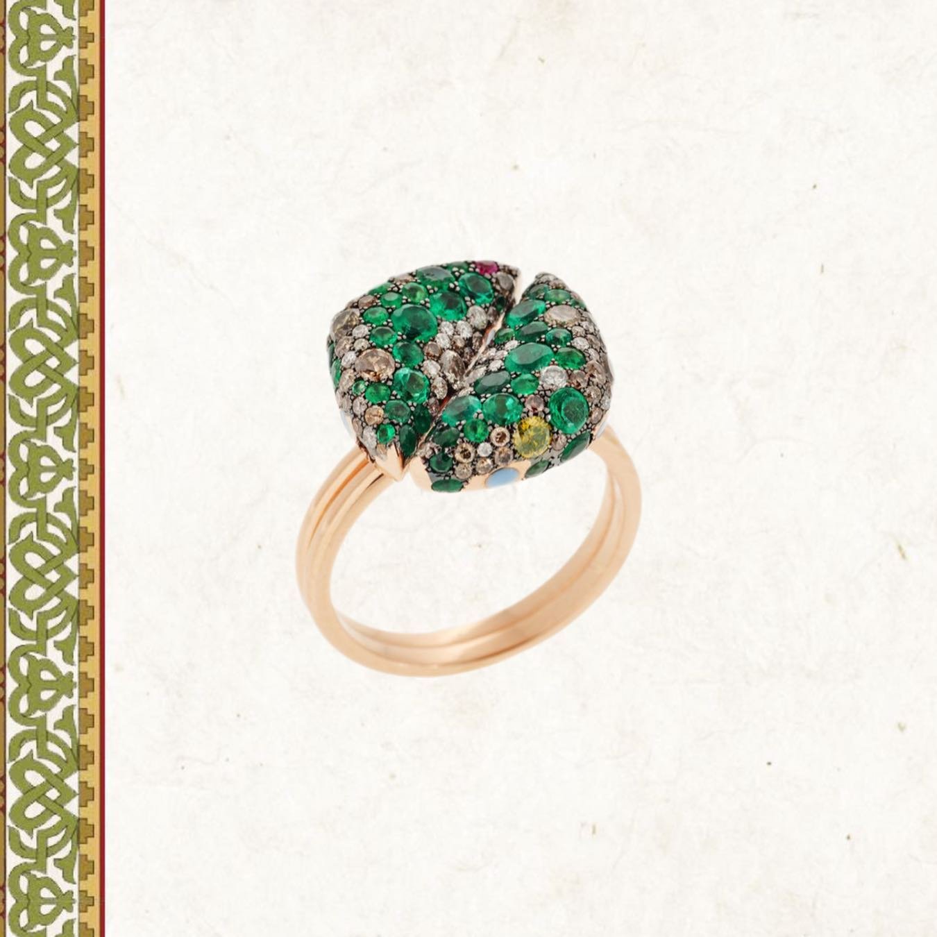 The Byzantine Garden ring 
Handcrafted in 18k gold, and includes Emerald Raffi, Brown Diamond, and White Diamond