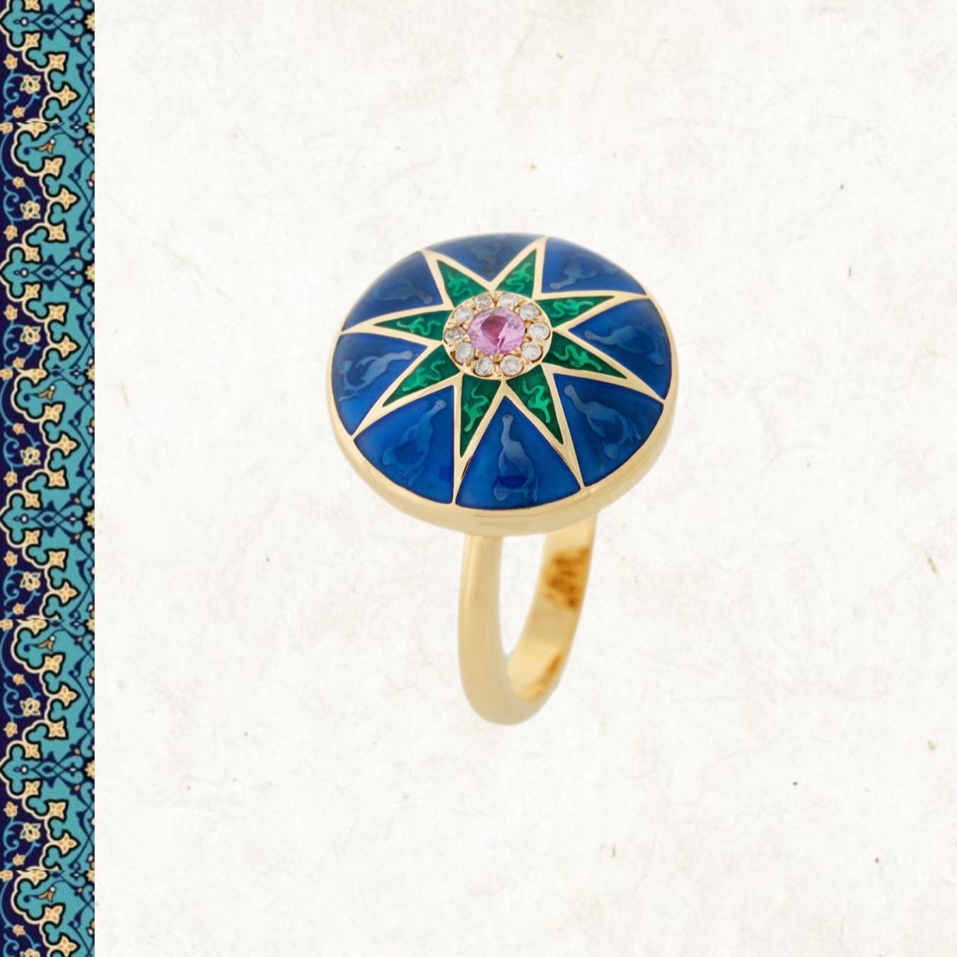 The Pottery Star ring is handcrafted with 18k gold, featuring white diamonds, sapphire, and complemented by green and blue enamel.