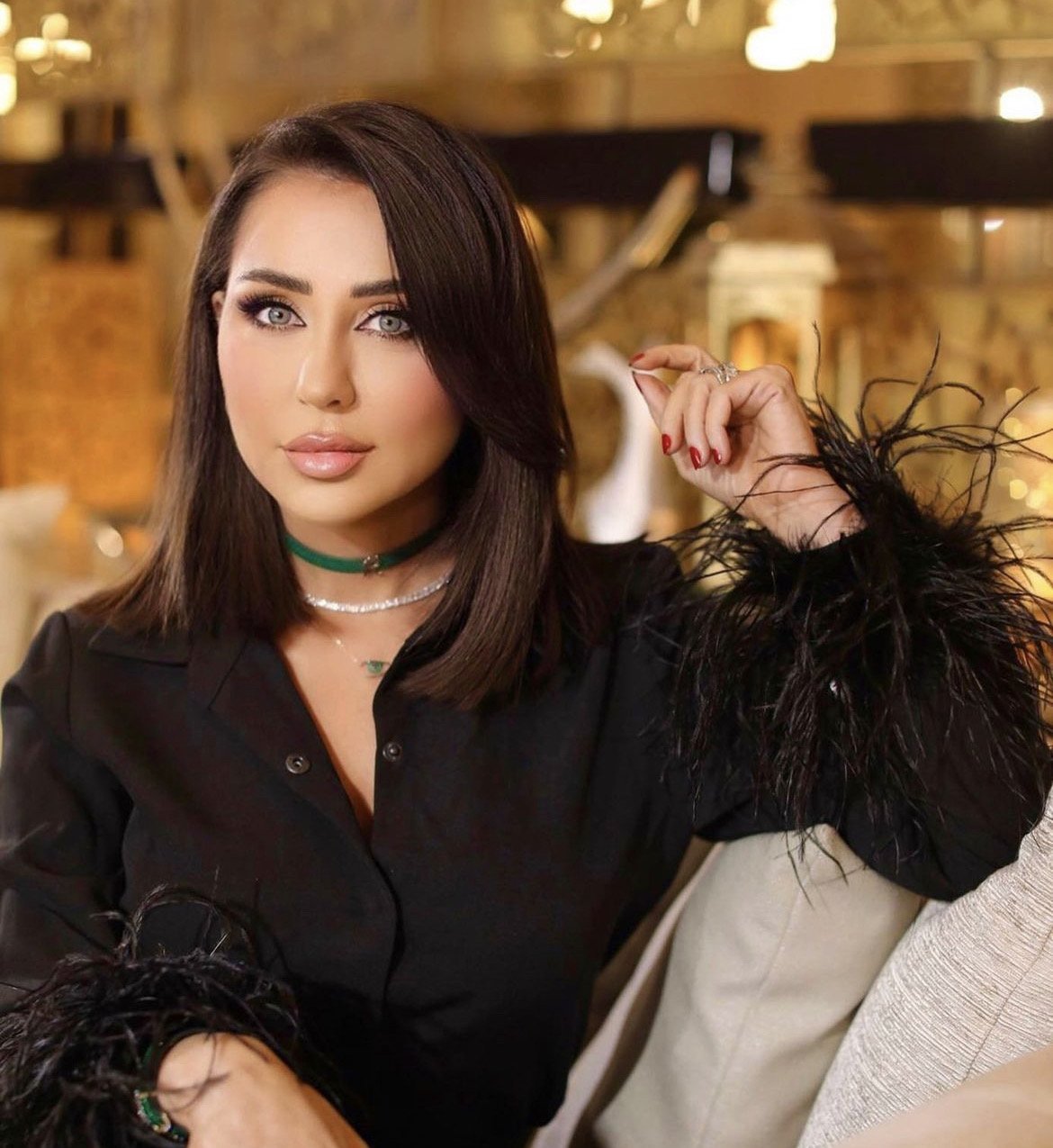 Wearing the Initial Sapphire Charm and the Ouyouni Necklace