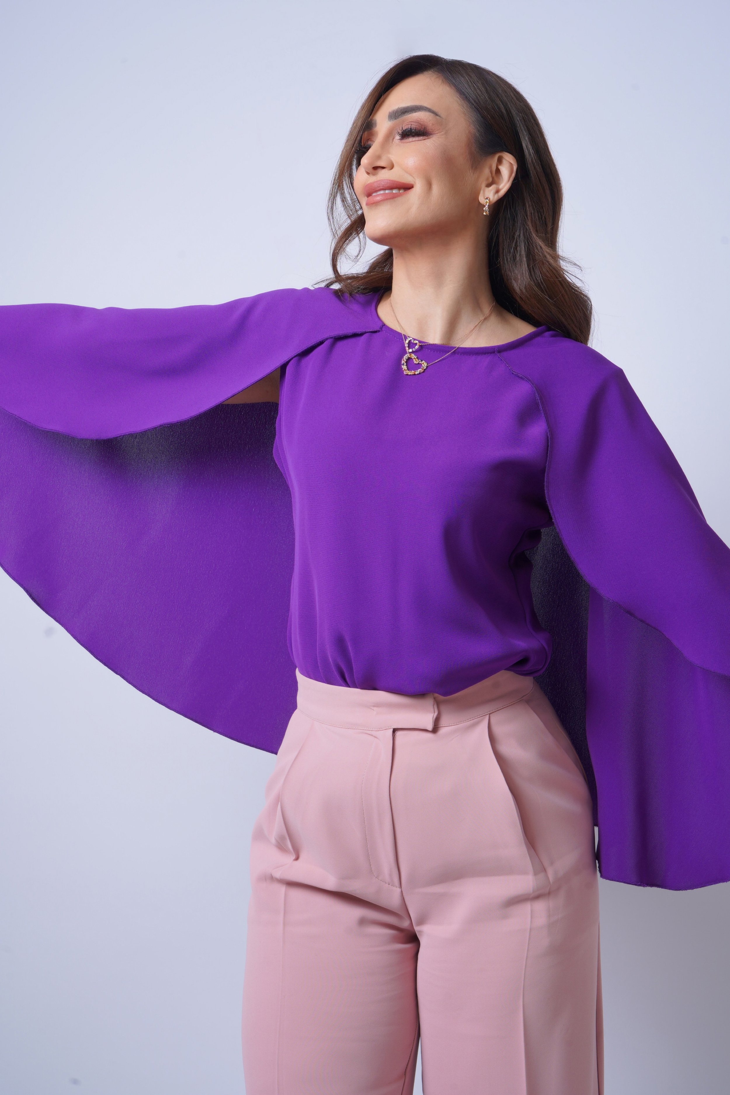 Hayat Al Zafir; vivid colors and a joyful energy. The sapphire pieces styled so uniquely during the shoot of The Hiya Show.