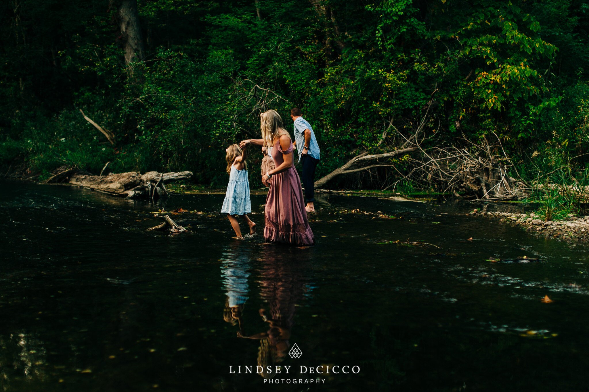 getting in the creek during family pictures