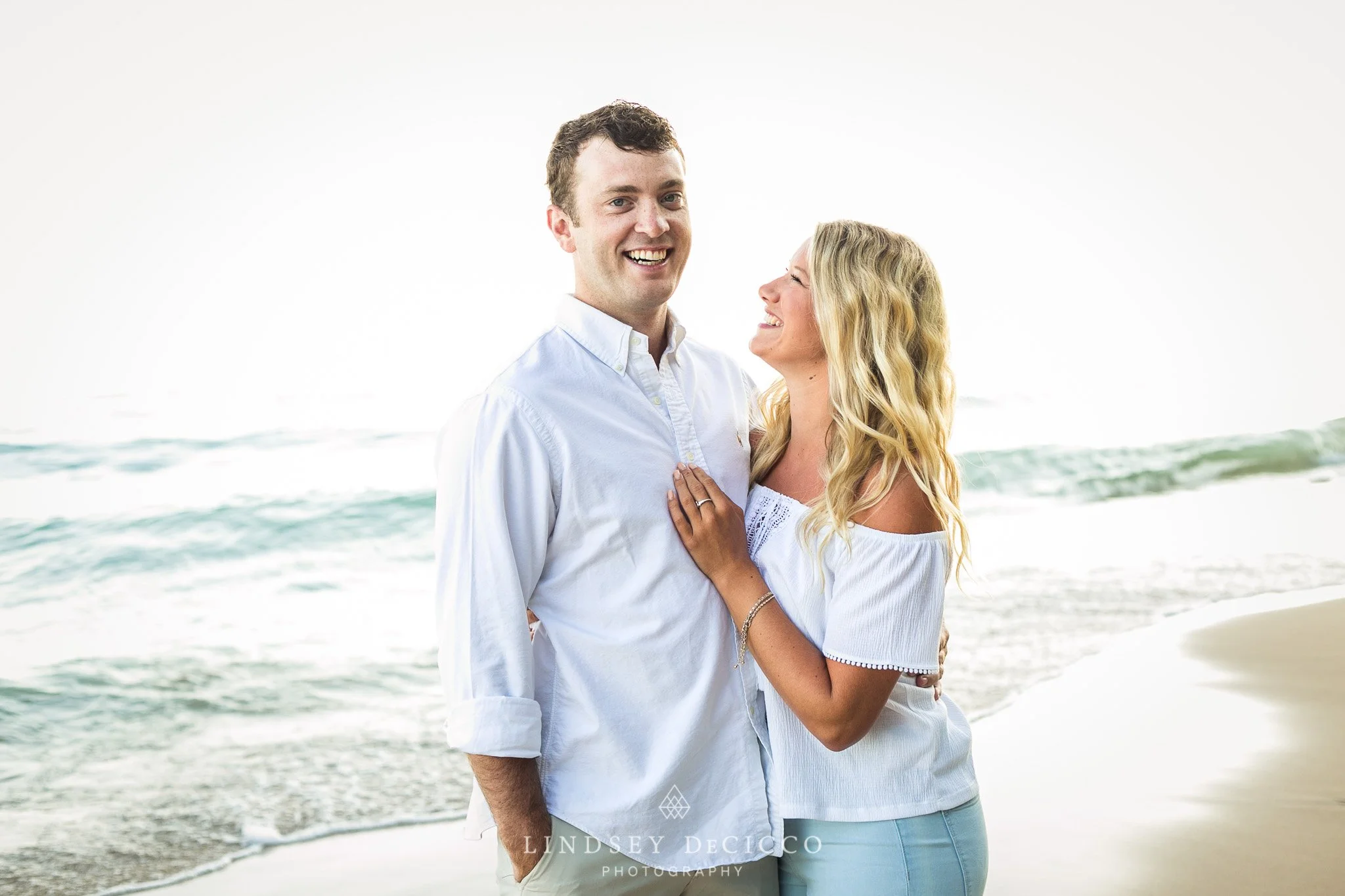 Couple smiling on the beach