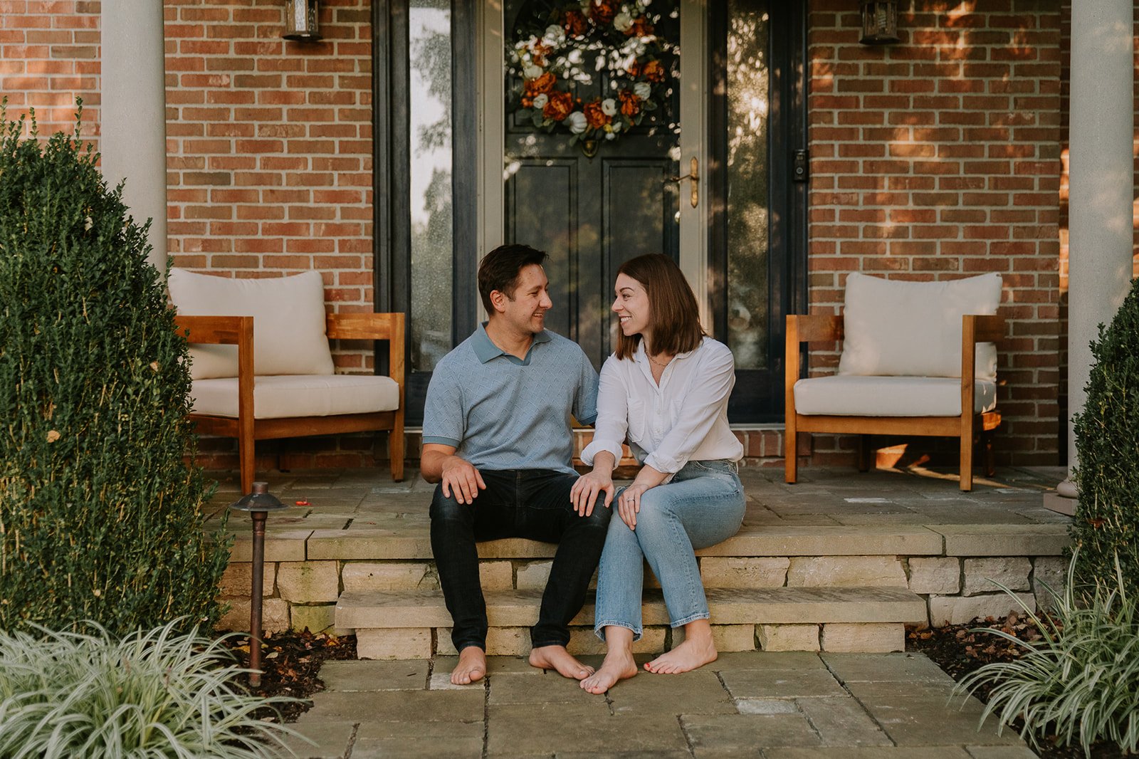 Parents Sharing a Moment on the Porch | South Bend Family Minis