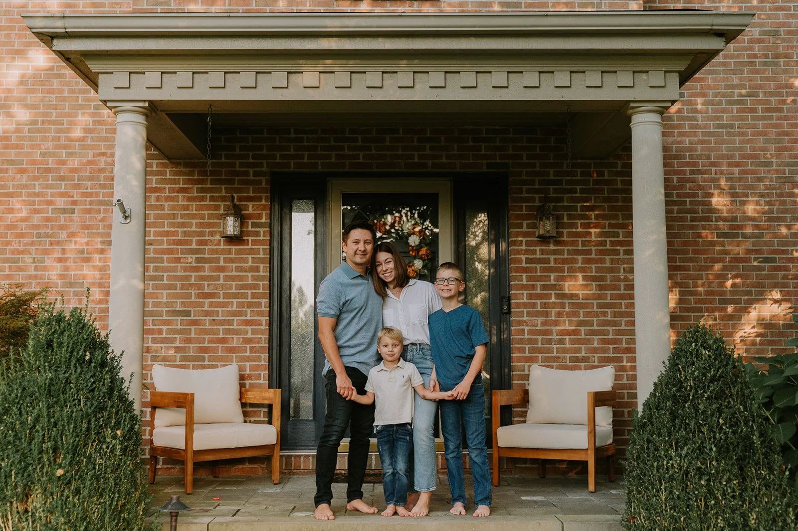 Family at Front Door of Brick Home | Front Porch Minis
