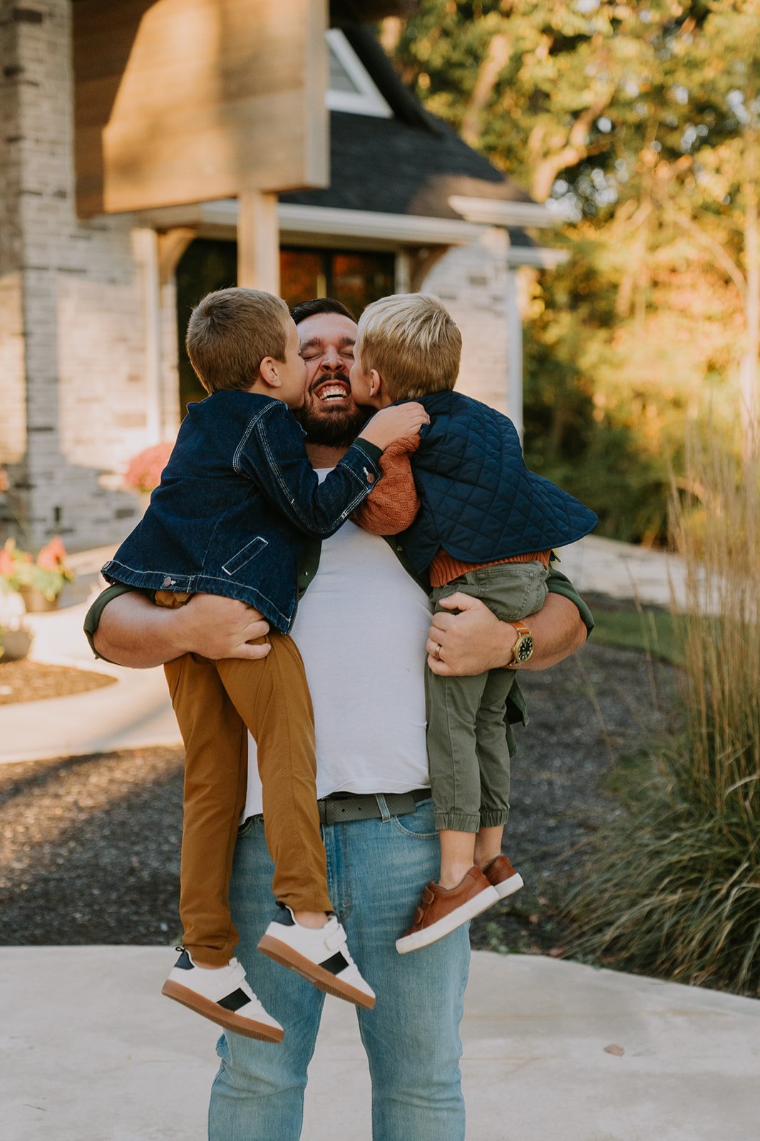 Playful Father and Sons Hug | Lifestyle Family Photography