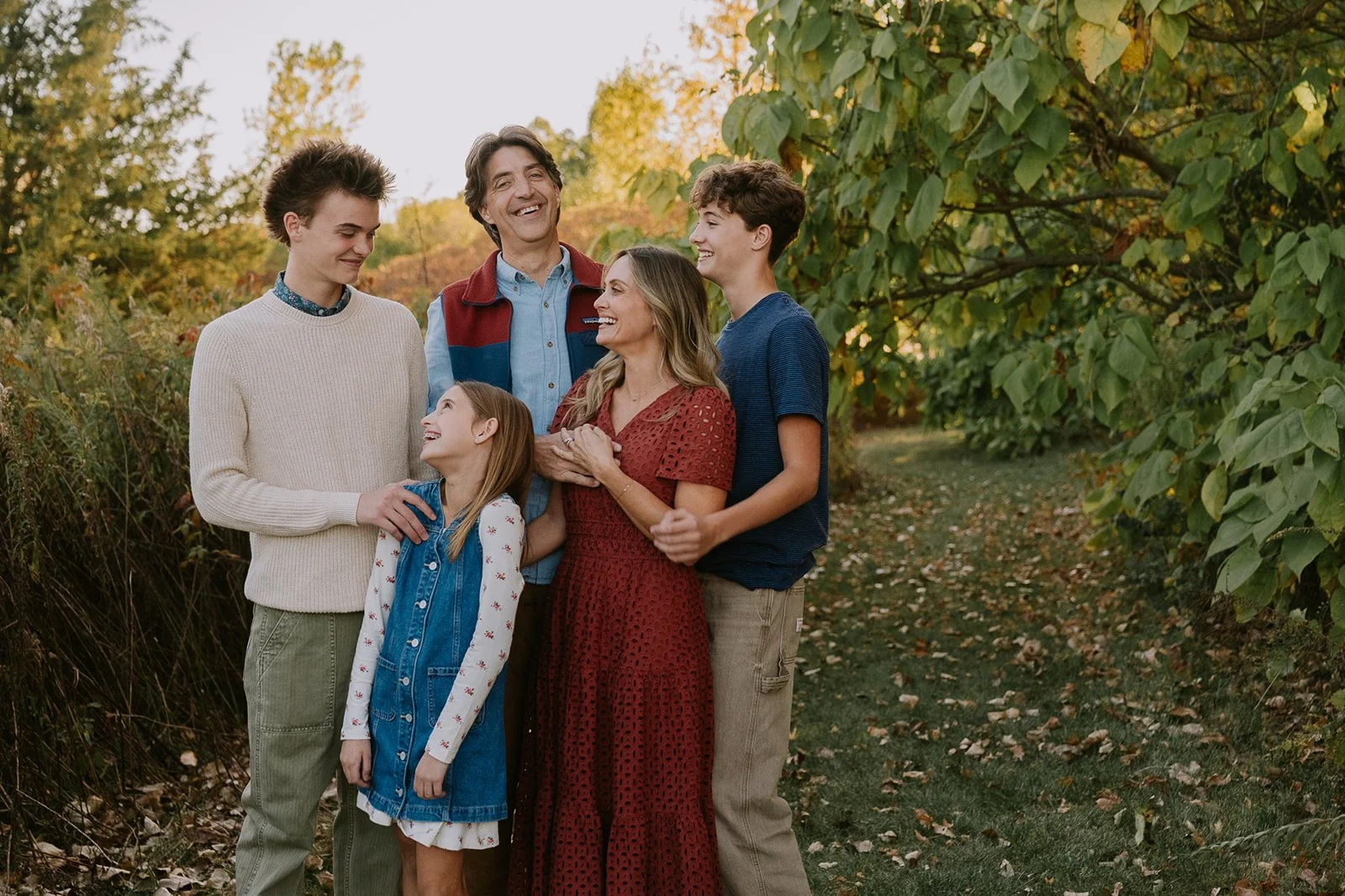 Warm Family Portrait Among Green Leaves | Meadows Edge Minis