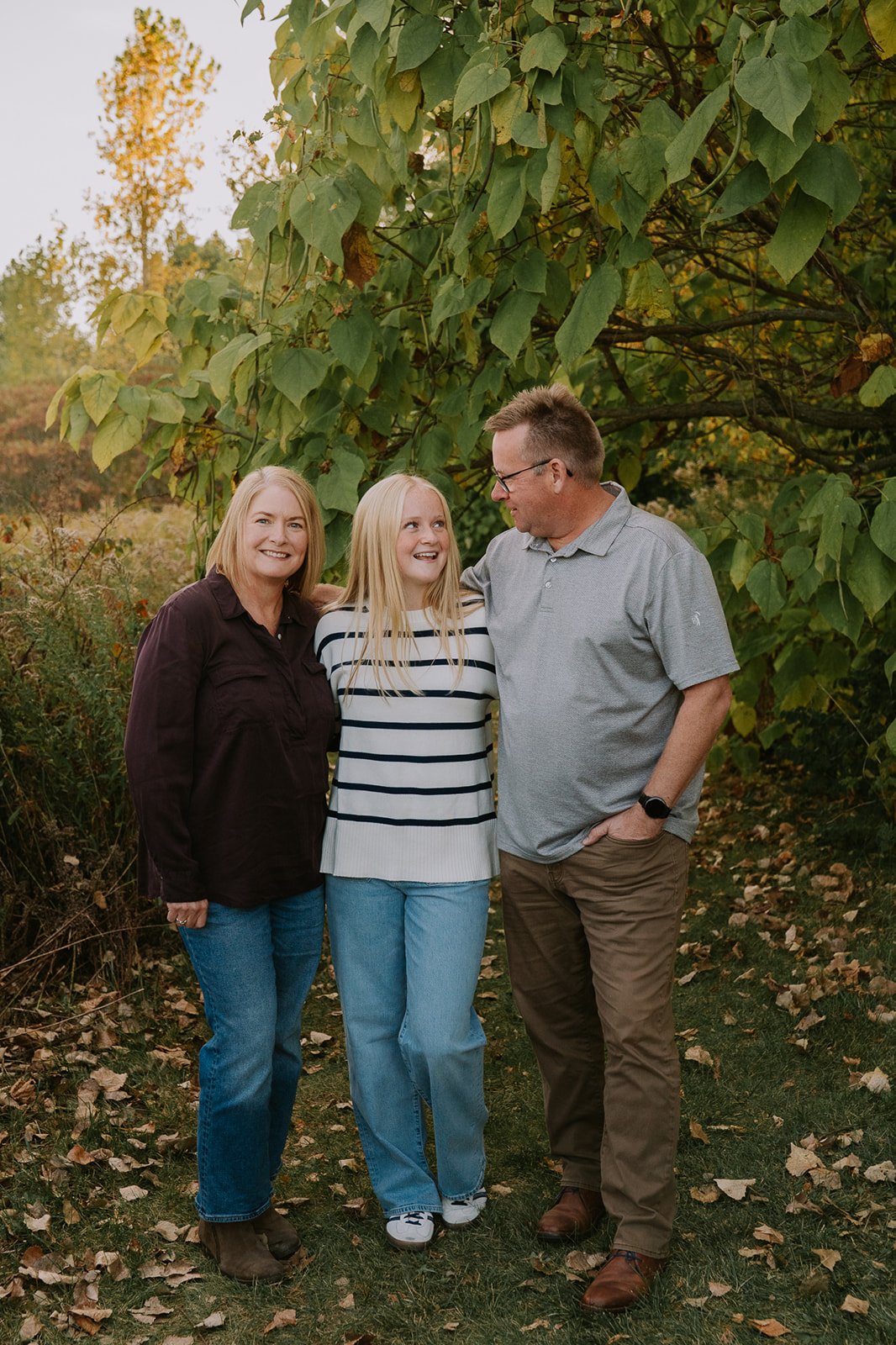 Parents with Teen Daughter in Meadow | Family Mini Sessions Indiana
