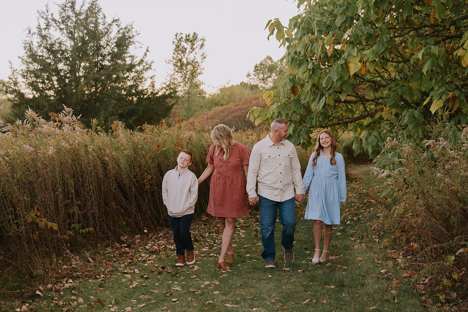Siblings Walking Through the Meadow | Family Mini Sessions Indiana