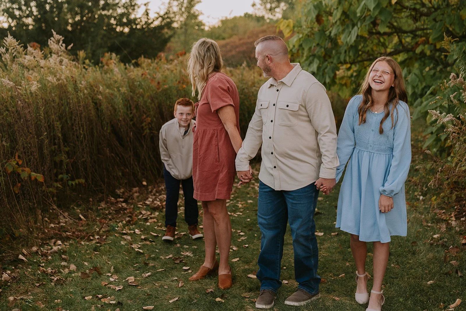 Playful Family Moment in Meadow | Meadows Edge Fall Mini Sessions
