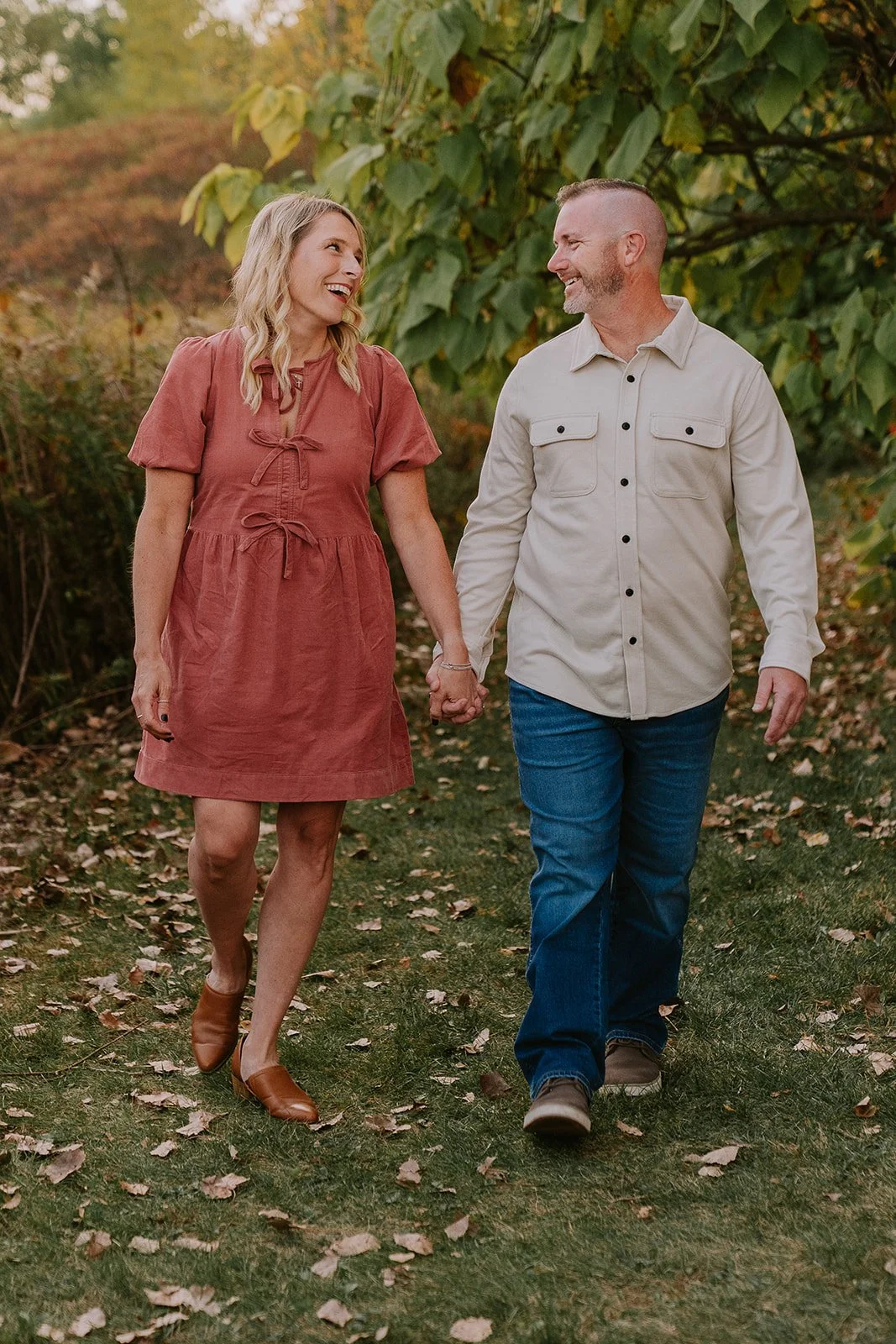 Parents Walking Through Meadows Edge | Lifestyle Fall Mini Session