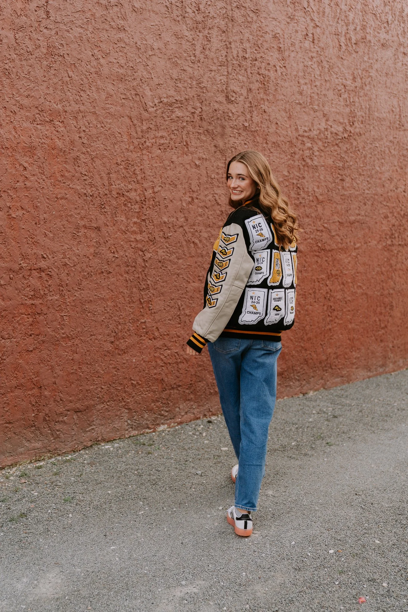 Girl in letterman jacket 