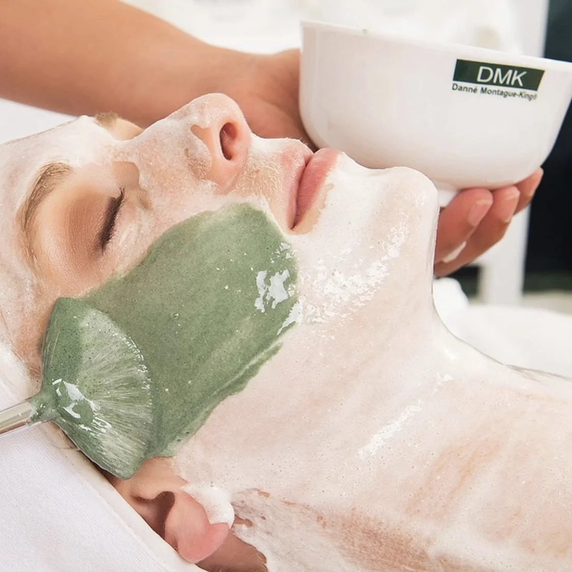 Woman having DMK treatment