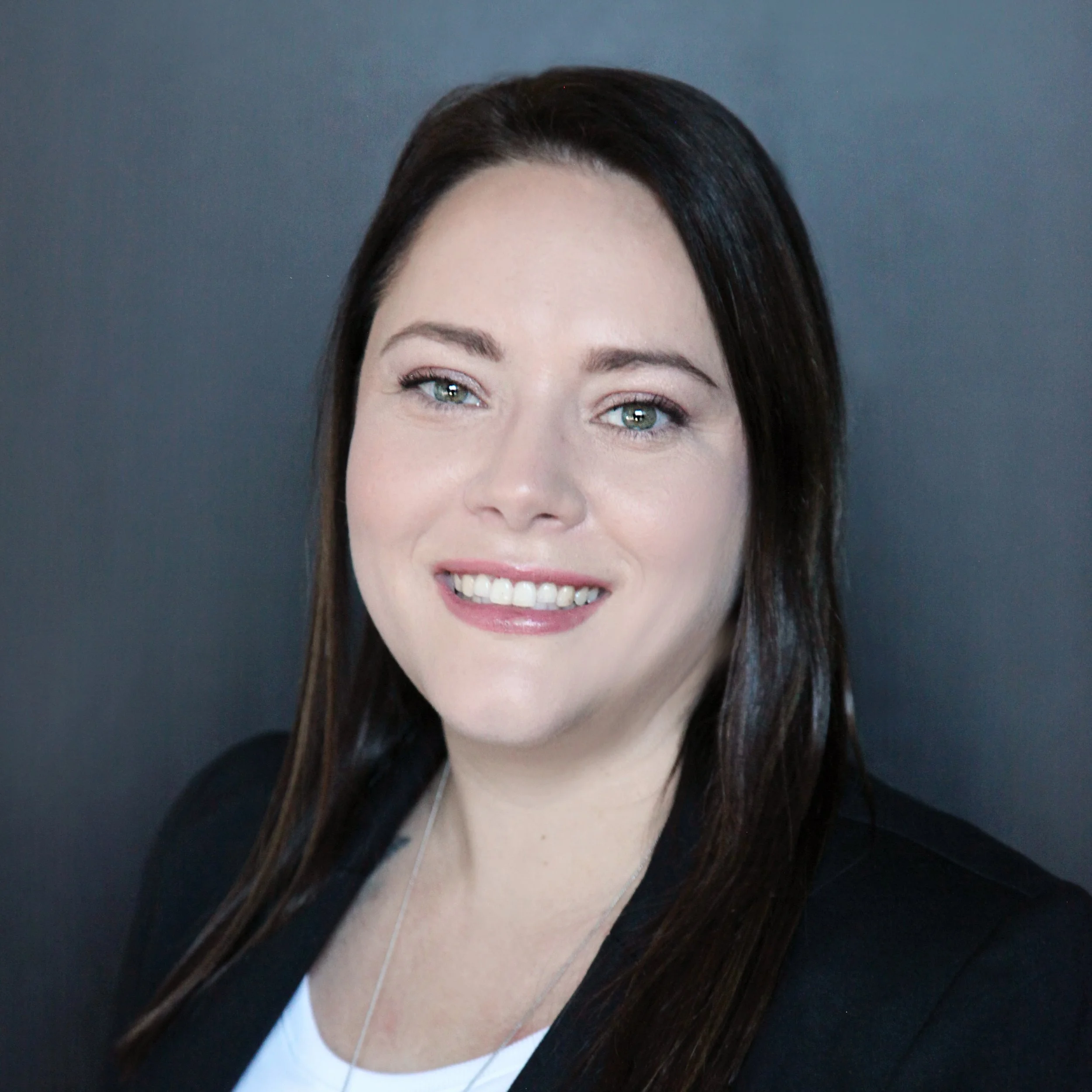 7-Catherine Facing Business Dark Background.jpg