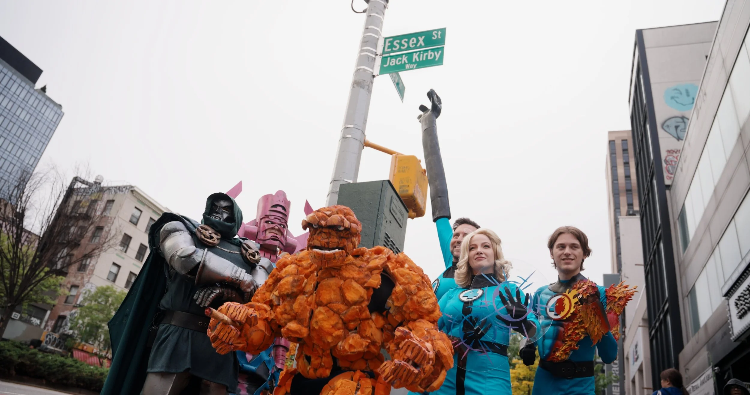 Cosplayers pose as Kirby's iconic superhero team