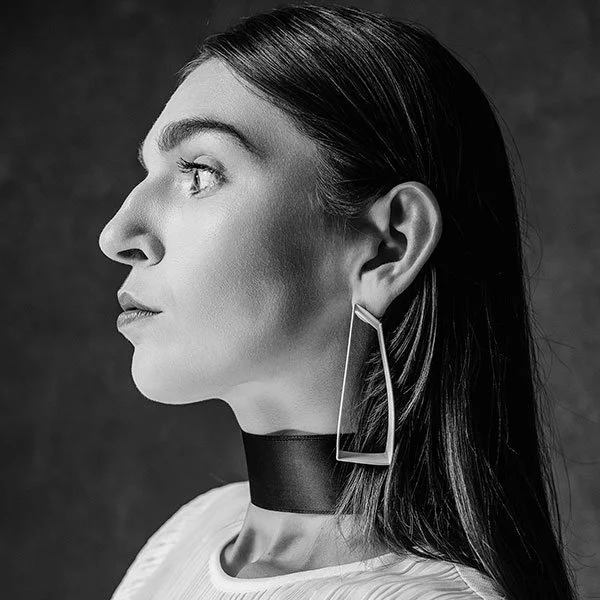 Fashion shoot in the studio of a female model.