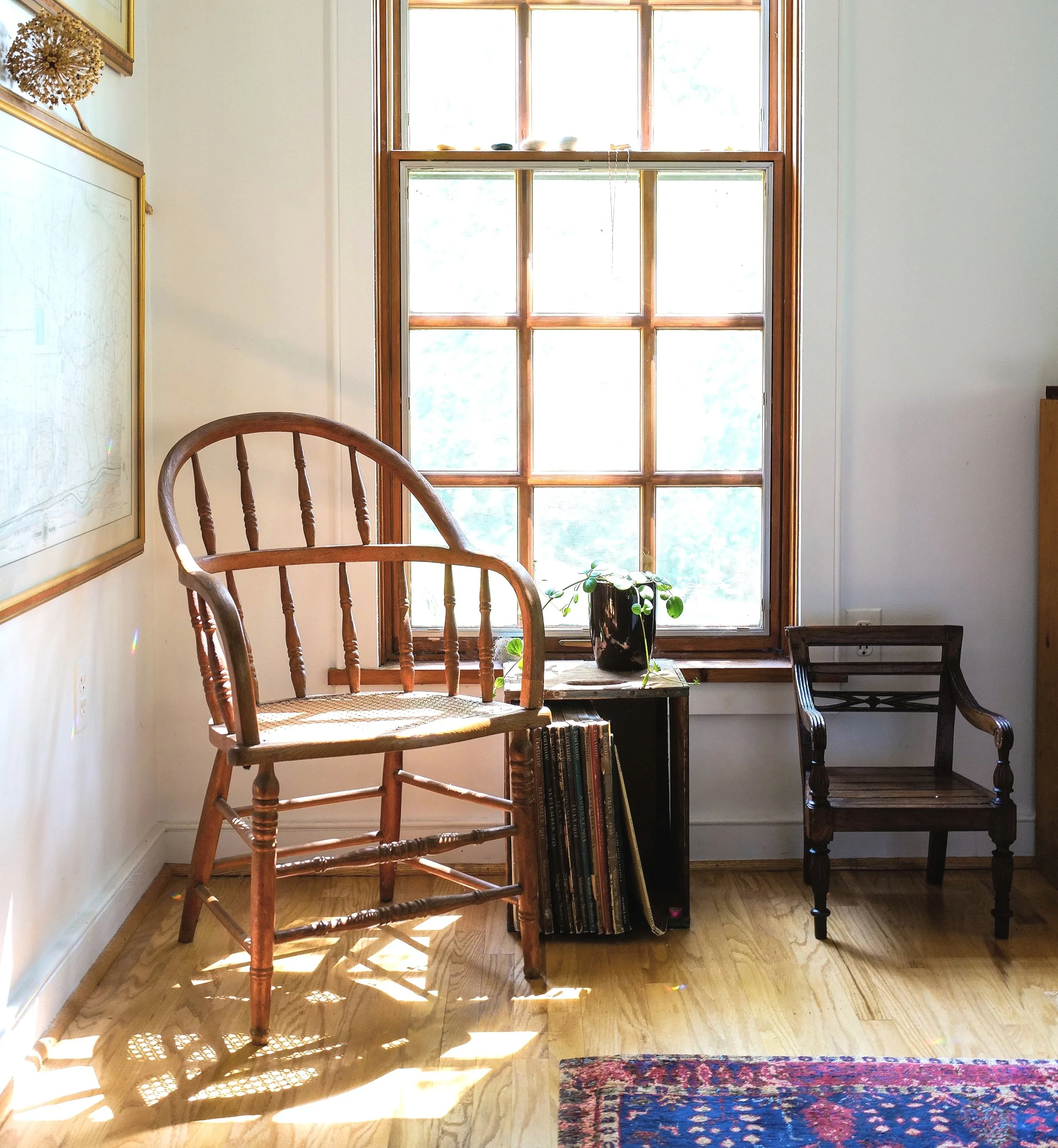 Living Room wooden chair window.jpg