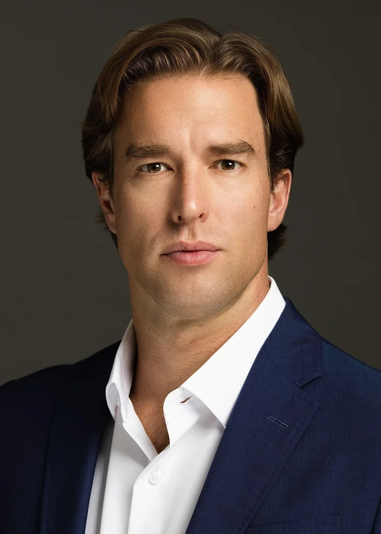 Professional business headshot photographed in the Draper Studios Denver studio