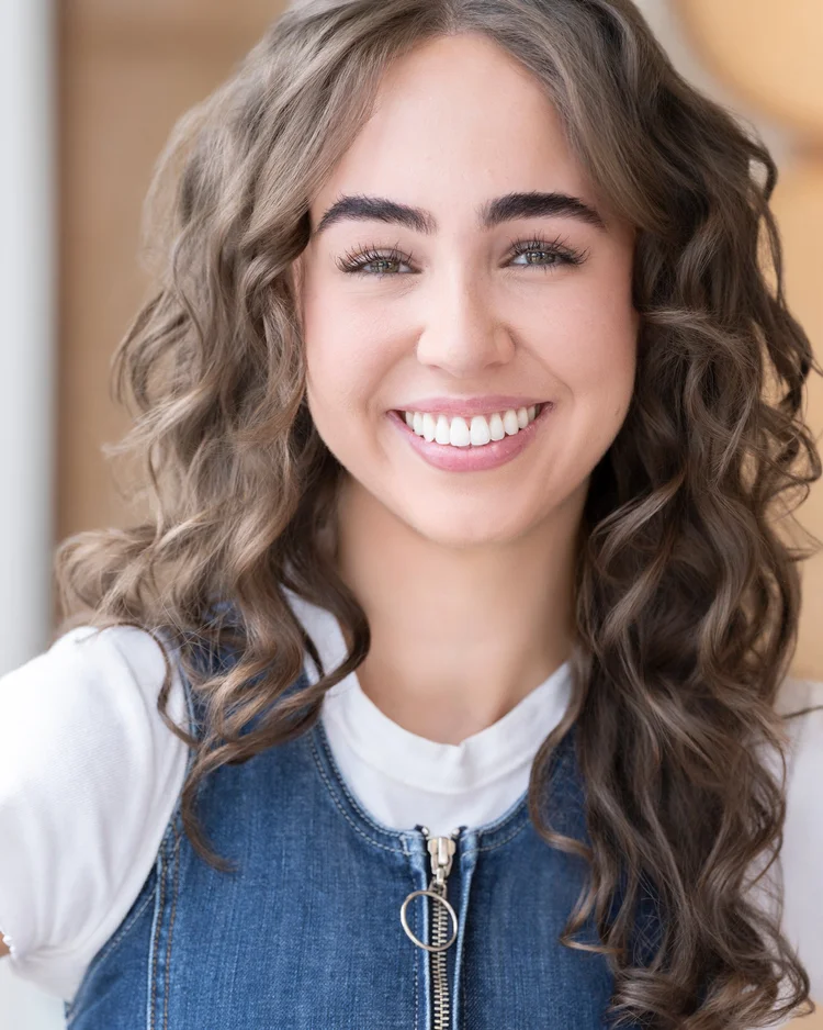 Cinematic actor headshot, commercial lane — warm and relatable casting, photographed in Denver