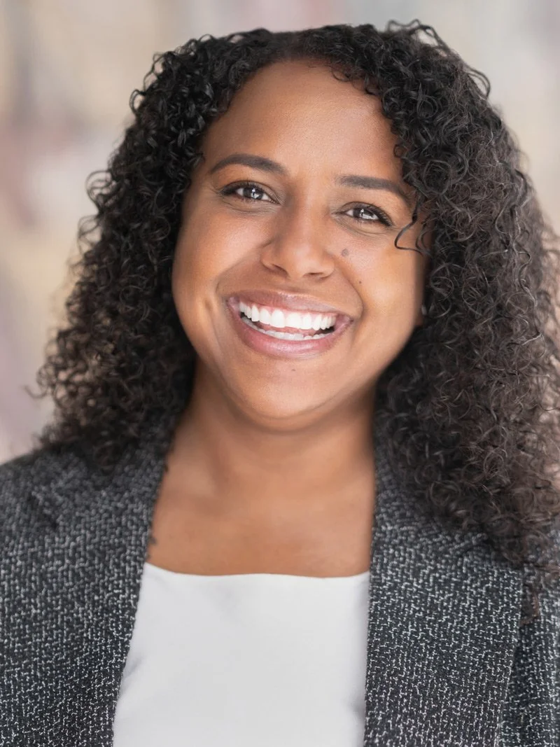 Professional headshot of a woman in a gray tweed blazer, Denver headshot photographer