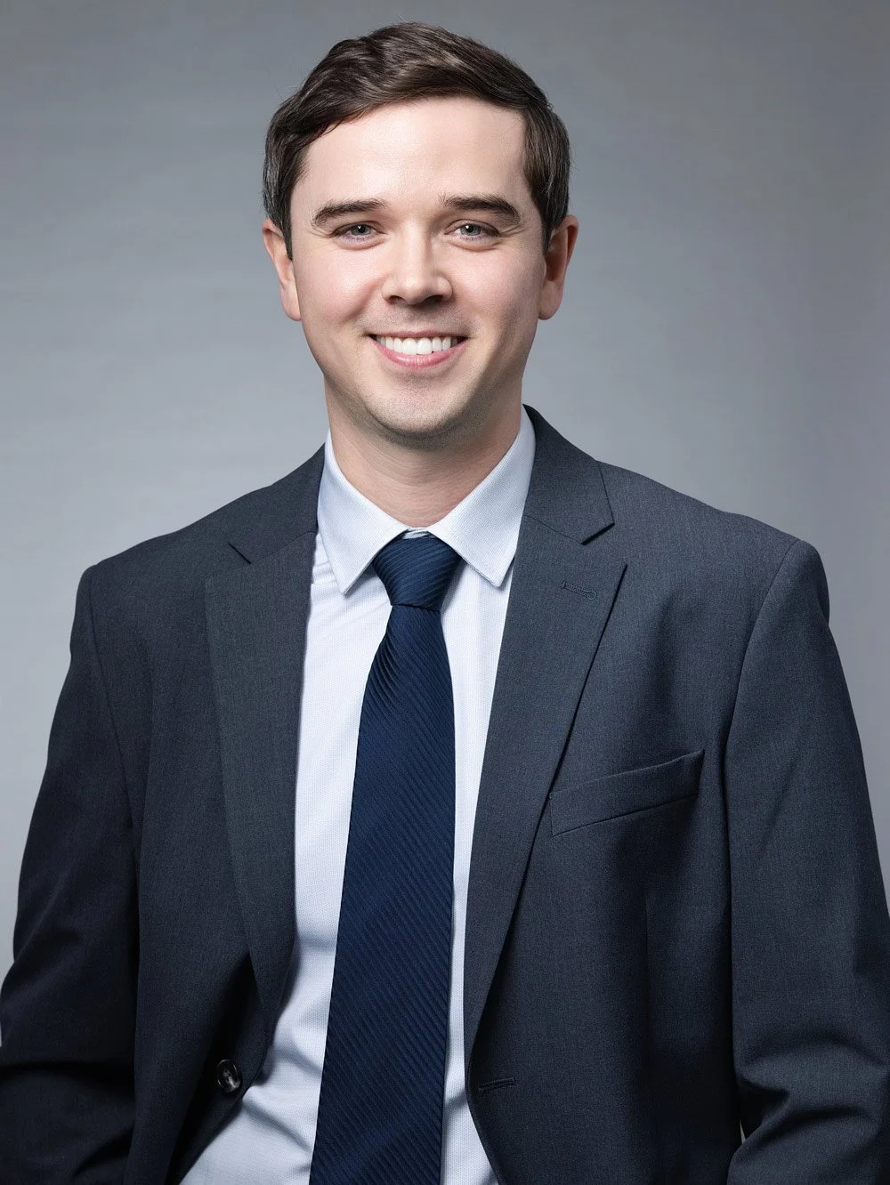 Professional corporate headshot example captured during on-site event photography in Denver.