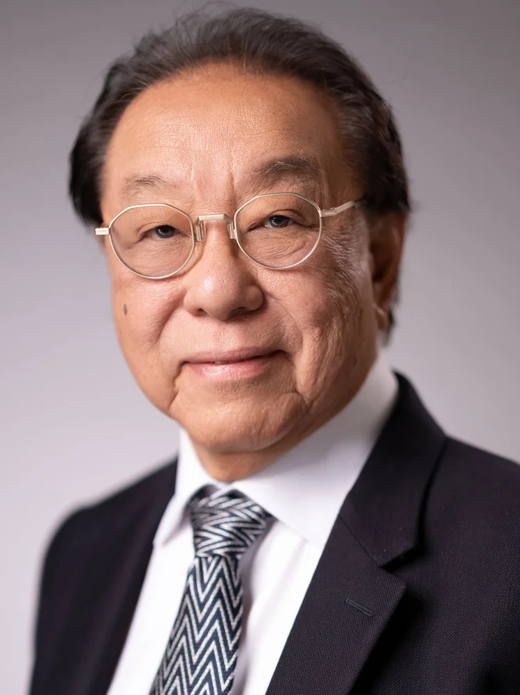 Executive portrait of a man in a suit and tie photographed by Draper Studios in Denver