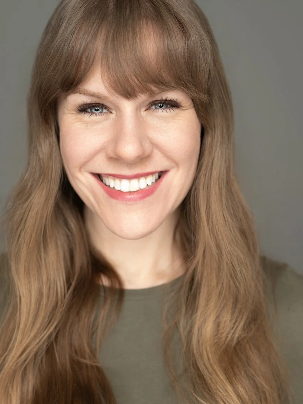 Smiling commercial female actor headshot