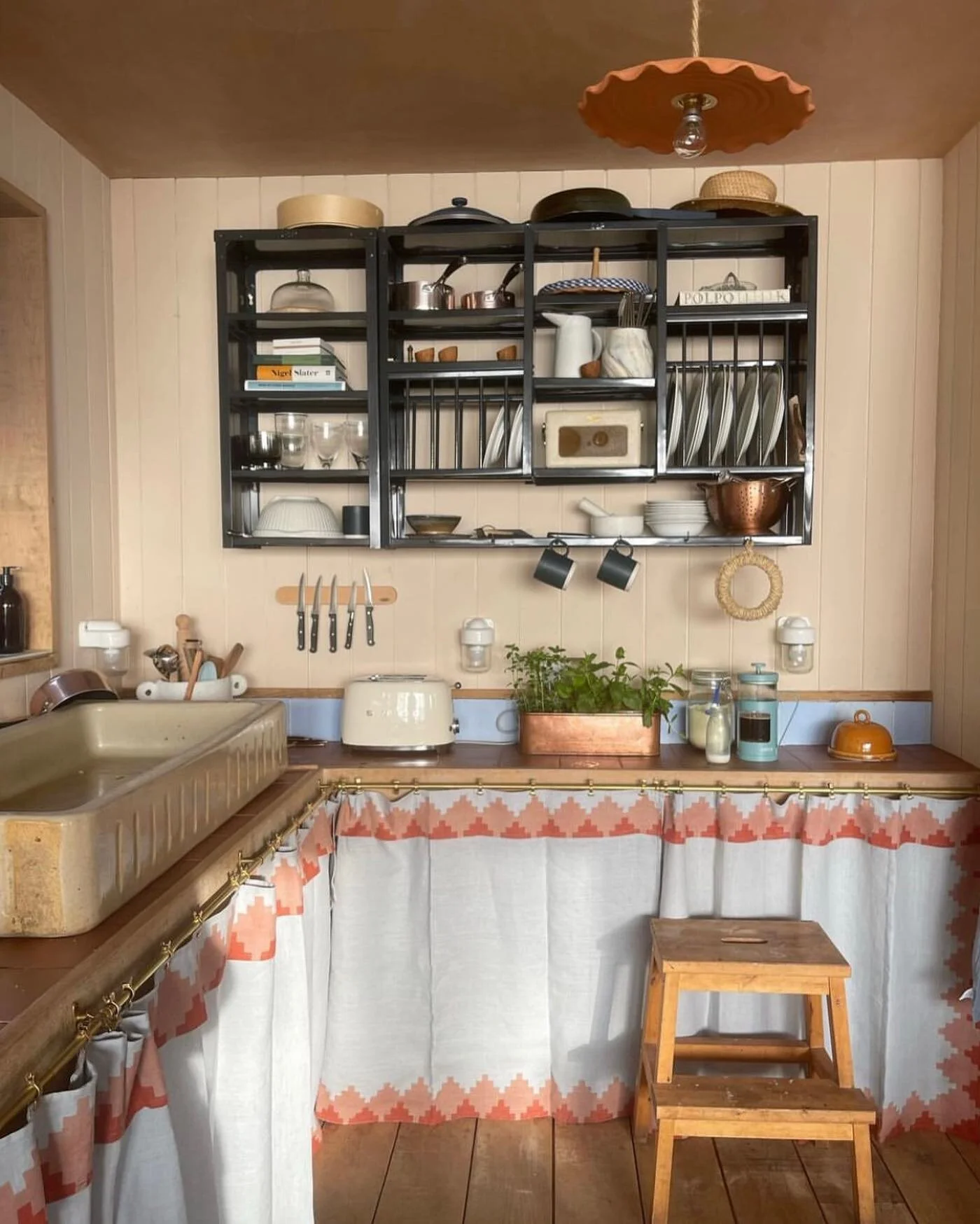 Love this snap by @matildagoad who stayed at @the_quist_treehouse over the weekend. The very clever @harrietchurchward repurposed our hand block printed tablecloths and made them into a snazzy counter curtain.