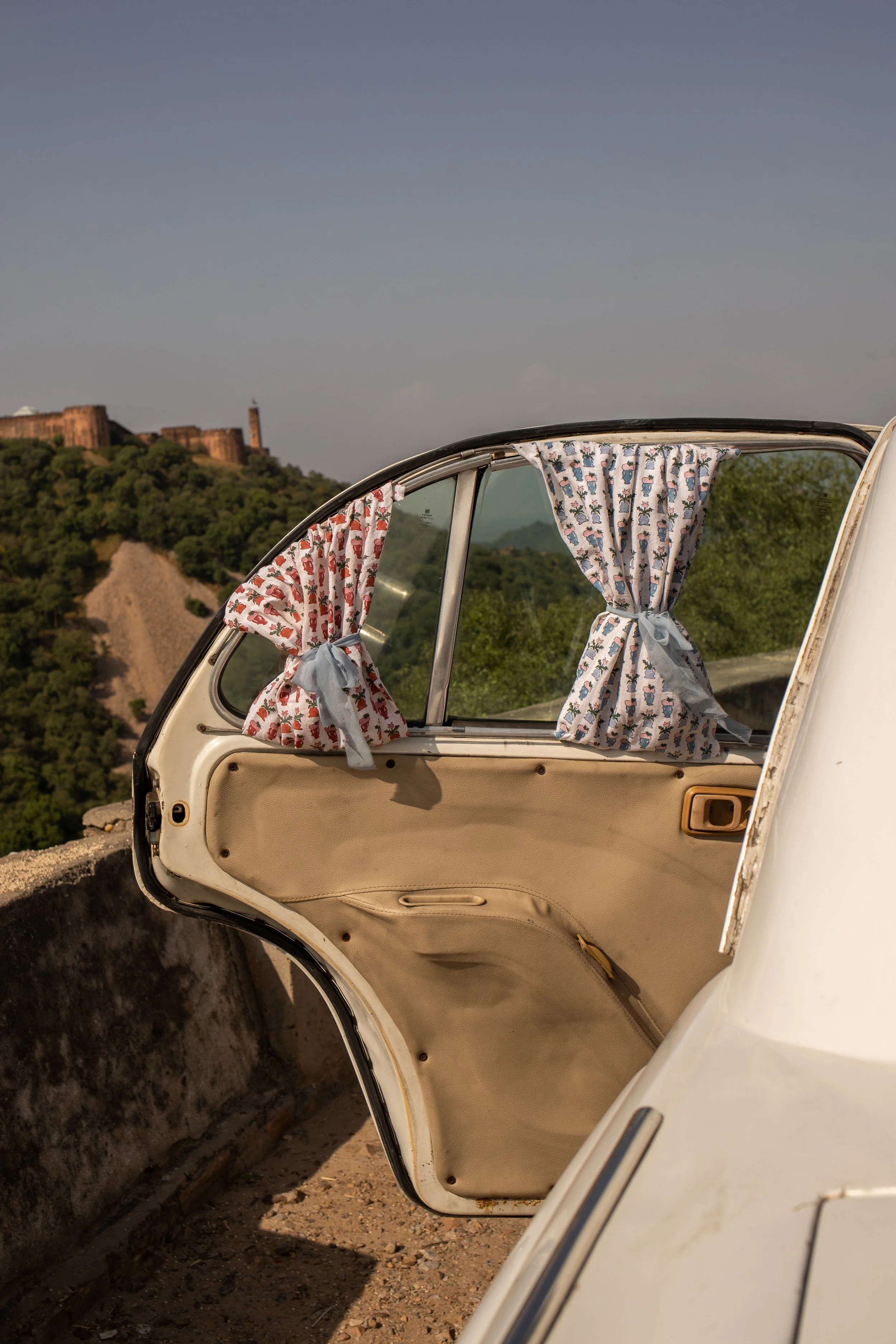 Flower Pot fabric used as mini curtains in the ambassador.