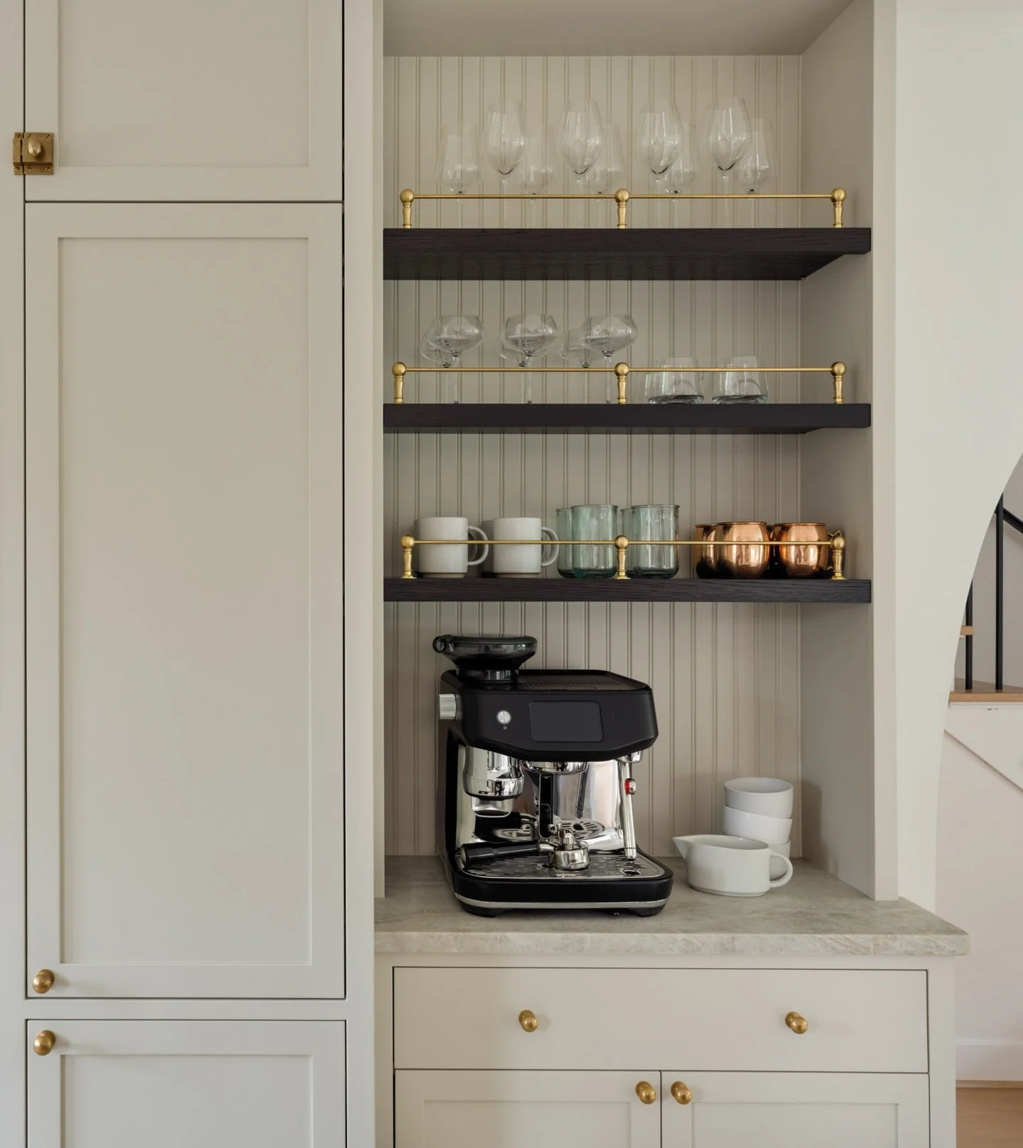 Heading into the new year, thoughtful routines matter more than big changes. A well planned beverage center keeps daily habits contained, functional, and out of the way, supporting the flow of the kitchen rather than disrupting. 
Swipe for before. A 