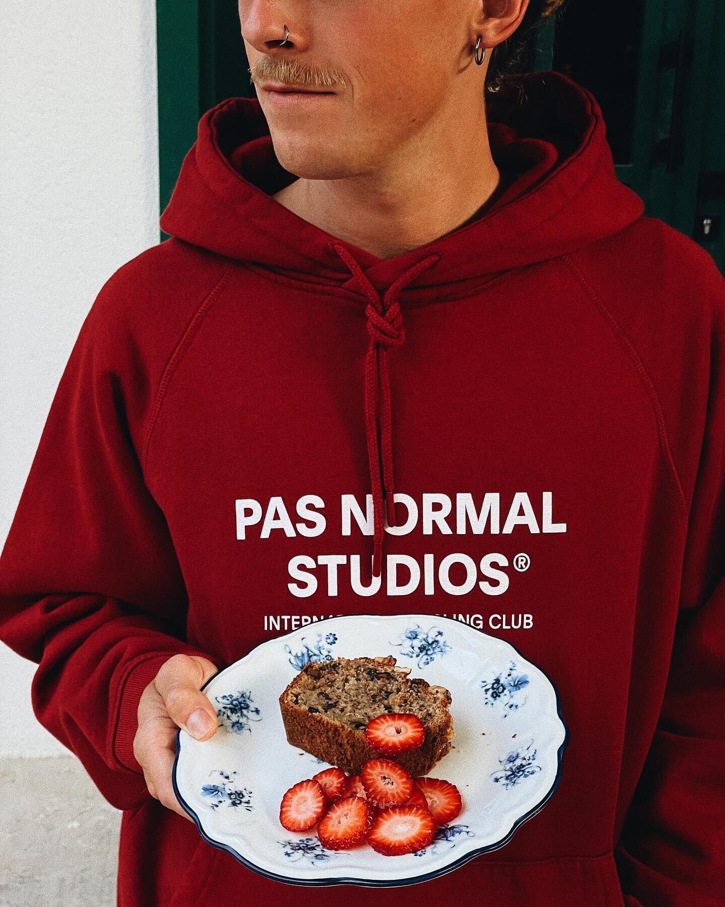 @pasnormalstudios off-race hoodie (unisex), available in our shop. Banana bread w/ strawberry (sex), available in our cafe 🍓🍌