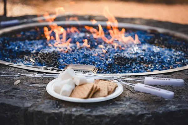 Outdoor fire pit and gathering space at Asante lodging and event venue in Dripping Springs Texas